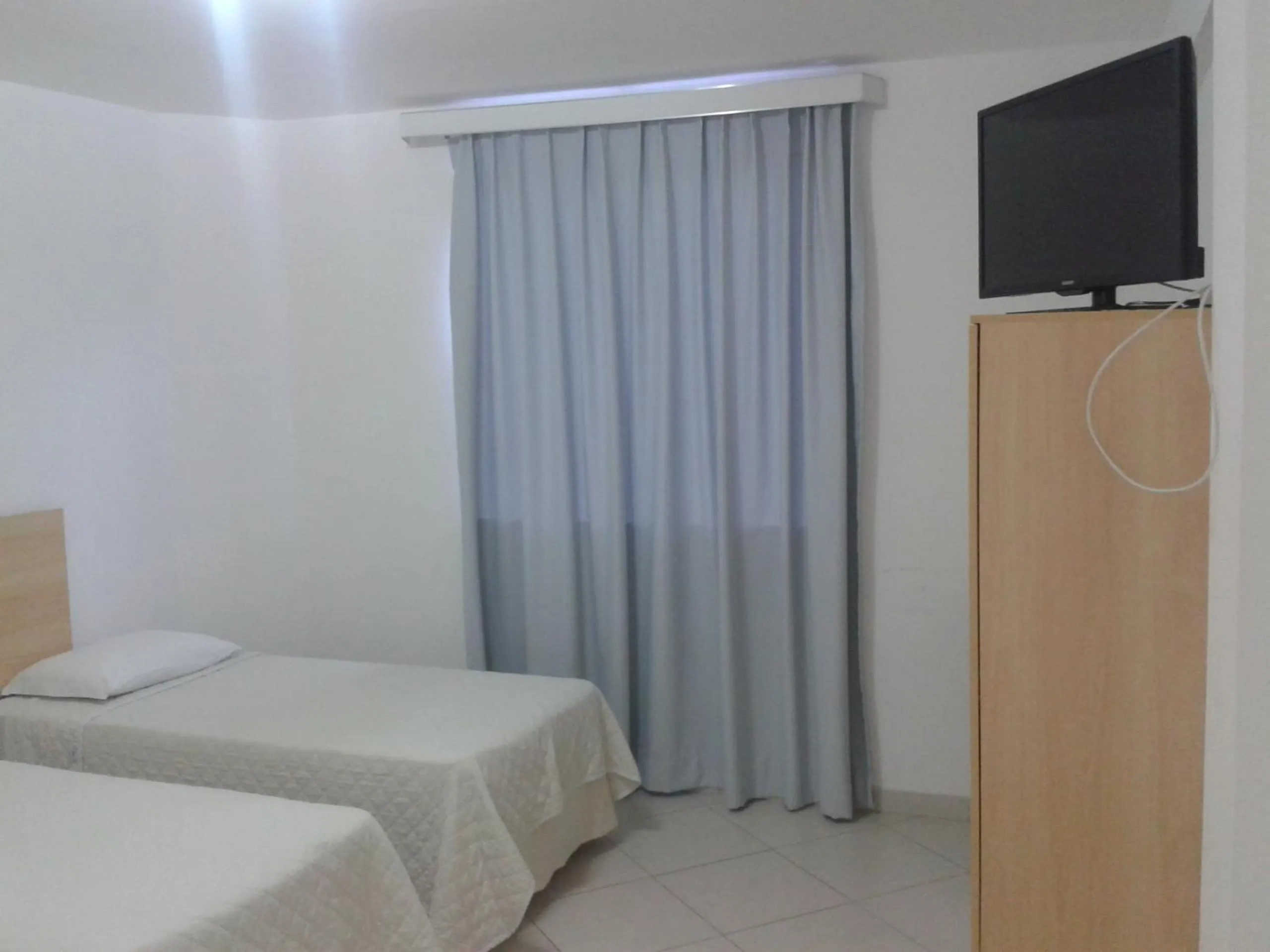 Bed in Pioneiro Hotel