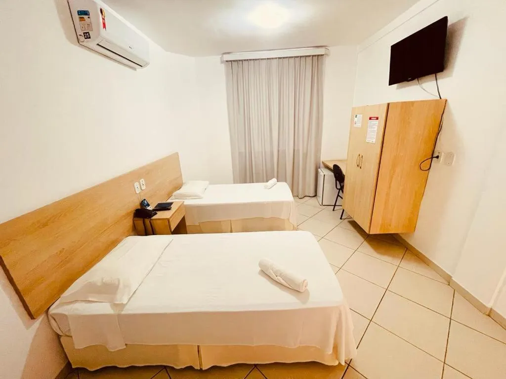 Bed in Pioneiro Hotel