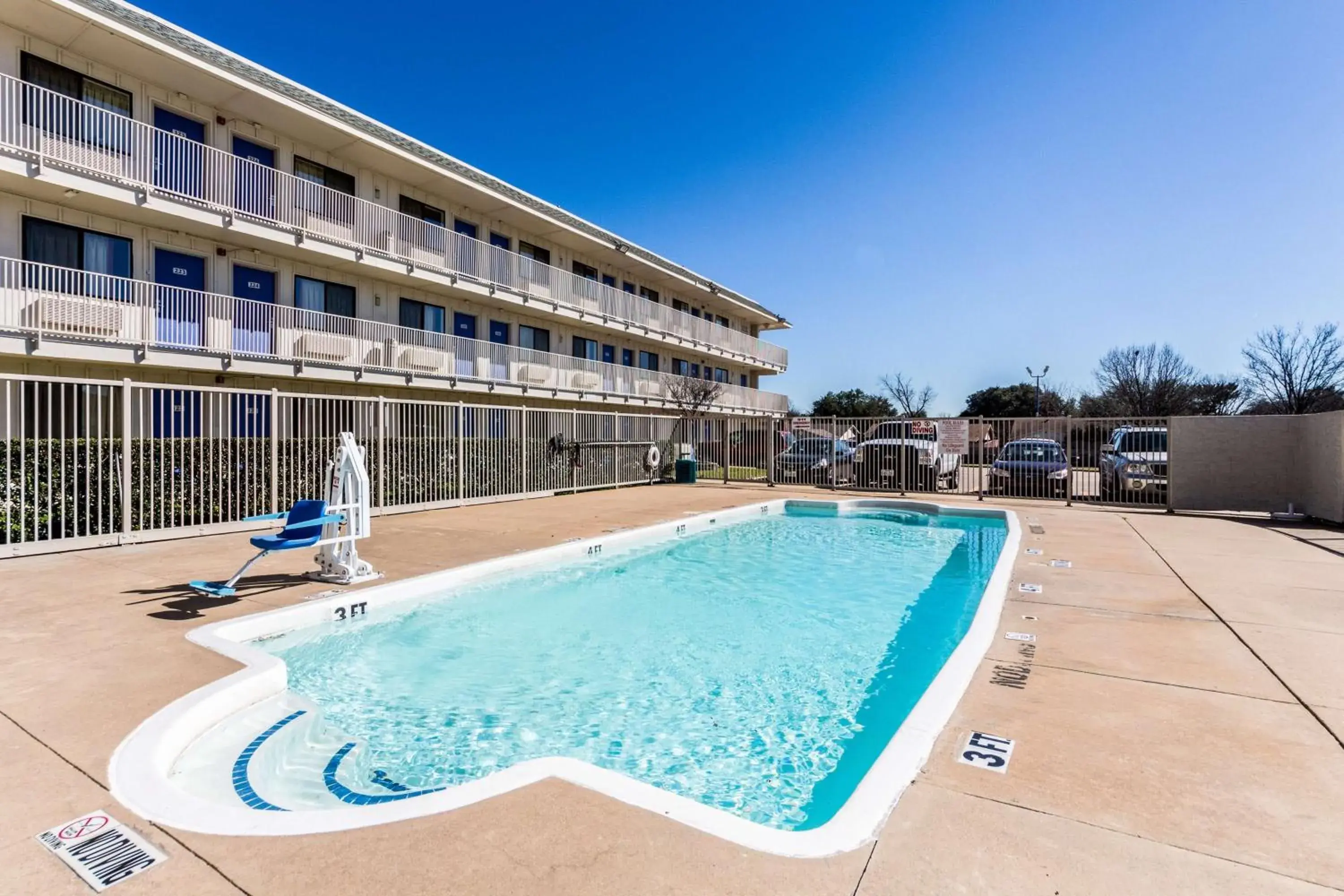 On site, Swimming Pool in Motel 6 Garland, TX - Dallas