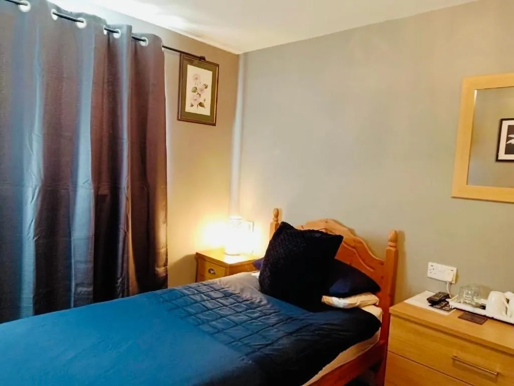 Bed in The Milton Accommodation