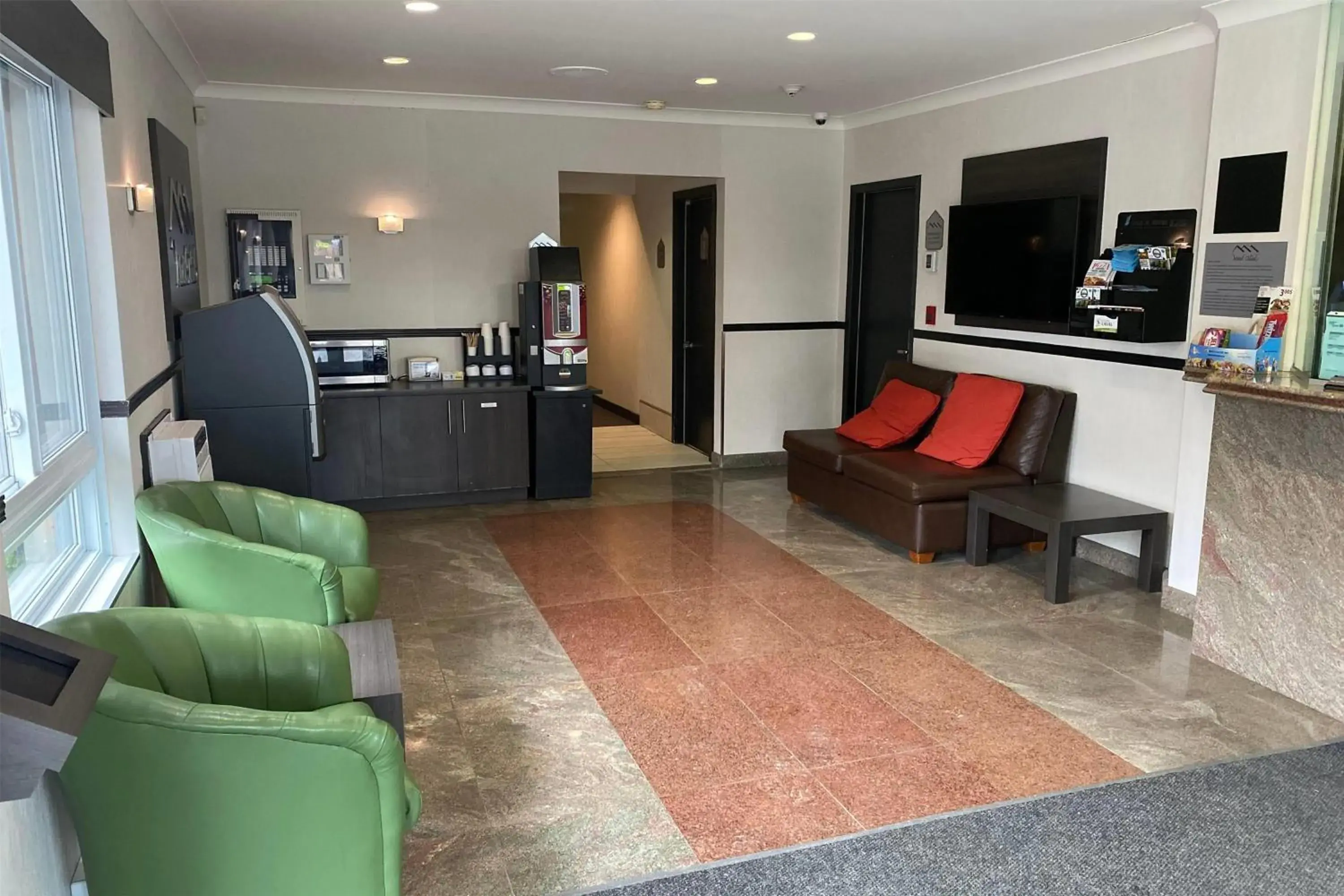 Lobby or reception in Ramada by Wyndham Laval Lobby or reception in Ramada by Wyndham Laval