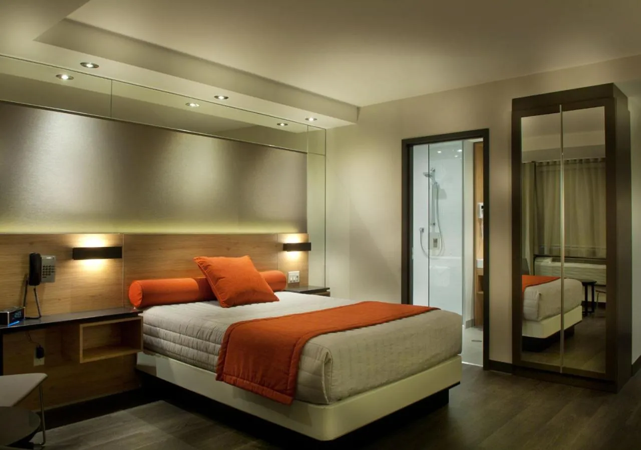 Bed in Ramada by Wyndham Laval