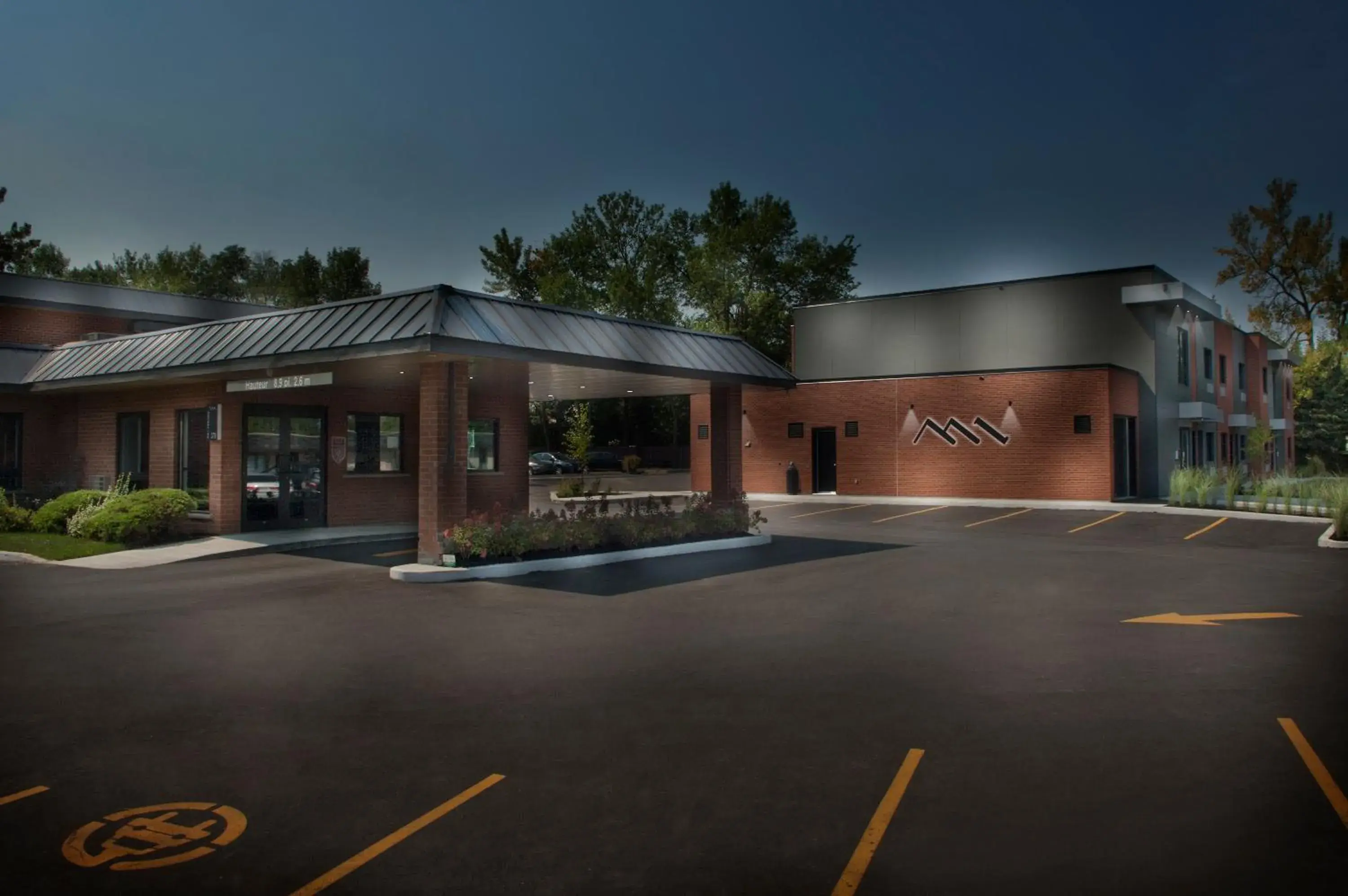 Property building in Ramada by Wyndham Laval Property building in Ramada by Wyndham Laval