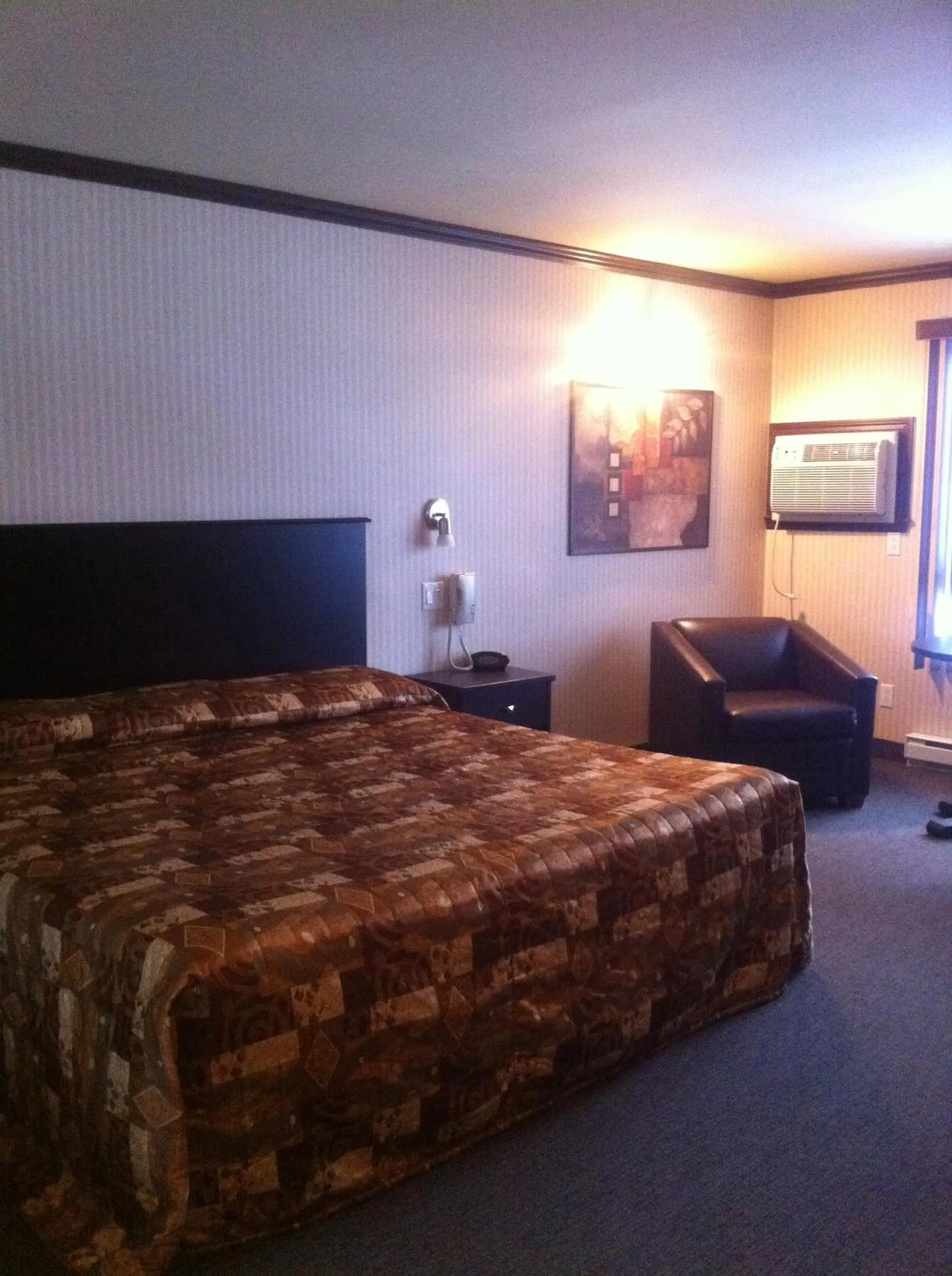 Bed in Ramada by Wyndham Laval