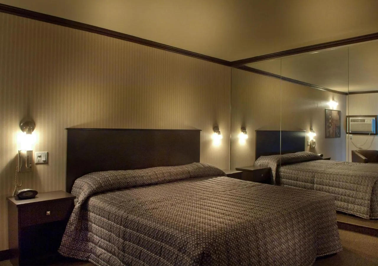 Bed in Ramada by Wyndham Laval