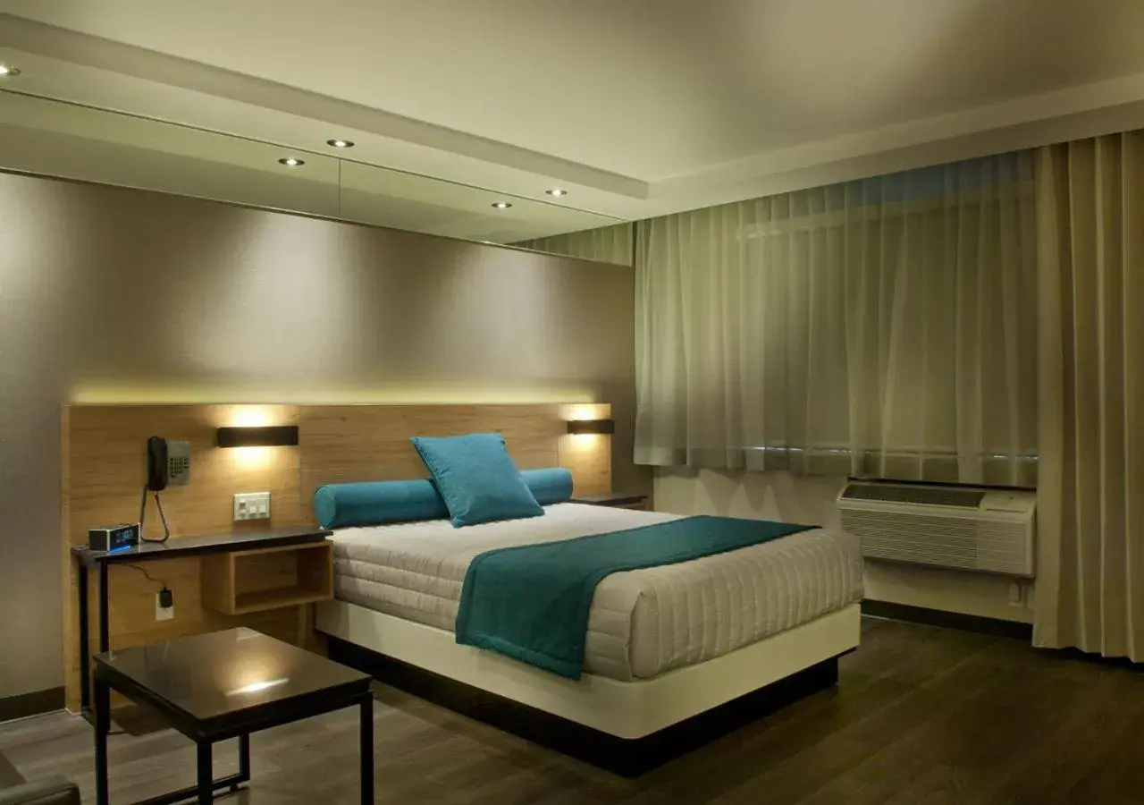 Superior Quadruple Room in Ramada by Wyndham Laval Superior Quadruple Room in Ramada by Wyndham Laval