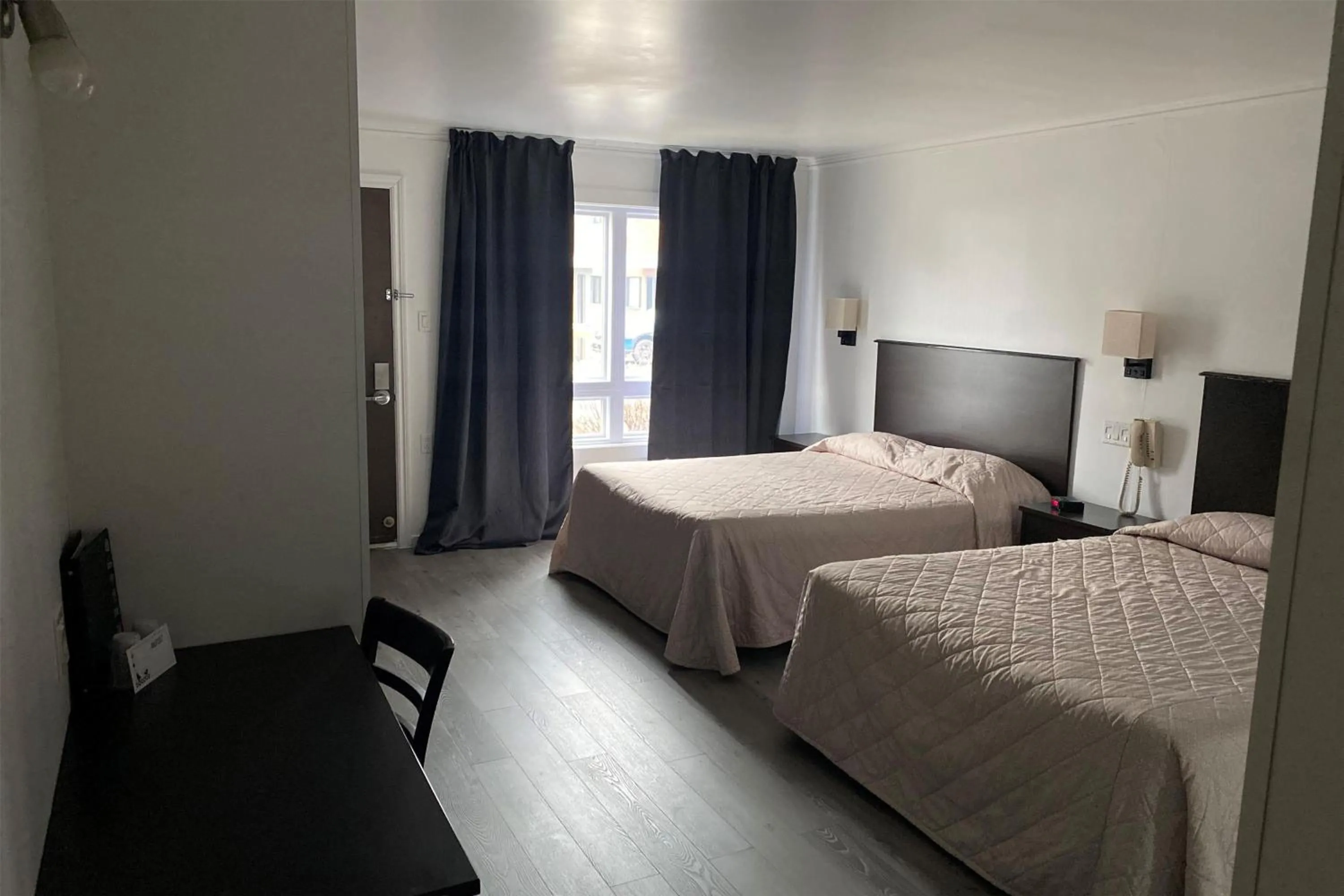 Photo of the whole room, Bed in Ramada by Wyndham Laval