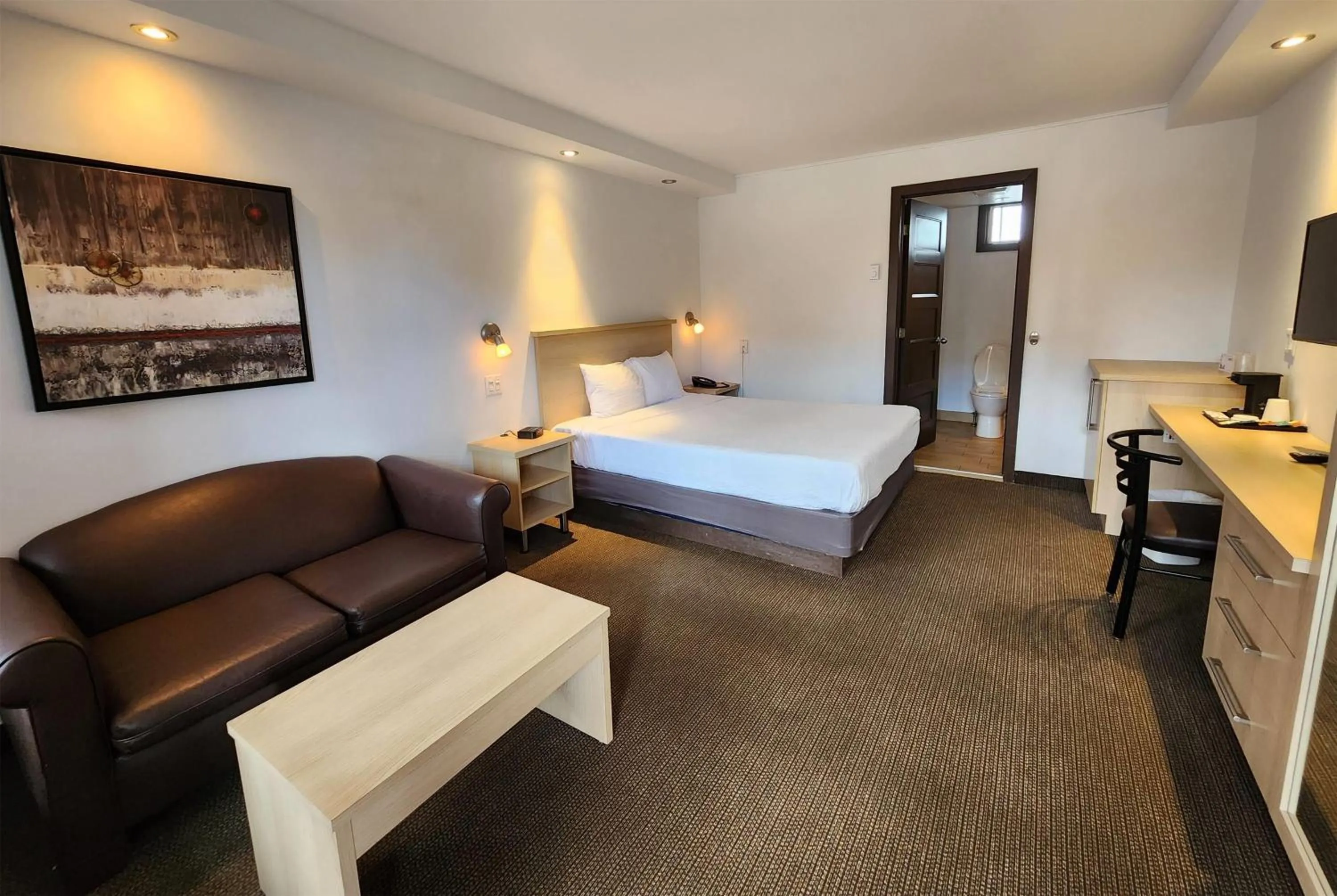 Photo of the whole room, Bed in Ramada by Wyndham Laval