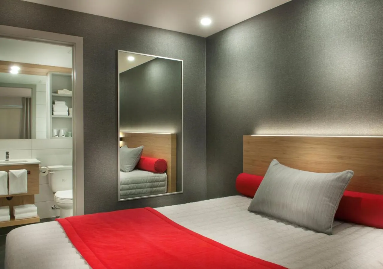 Bed in Ramada by Wyndham Laval