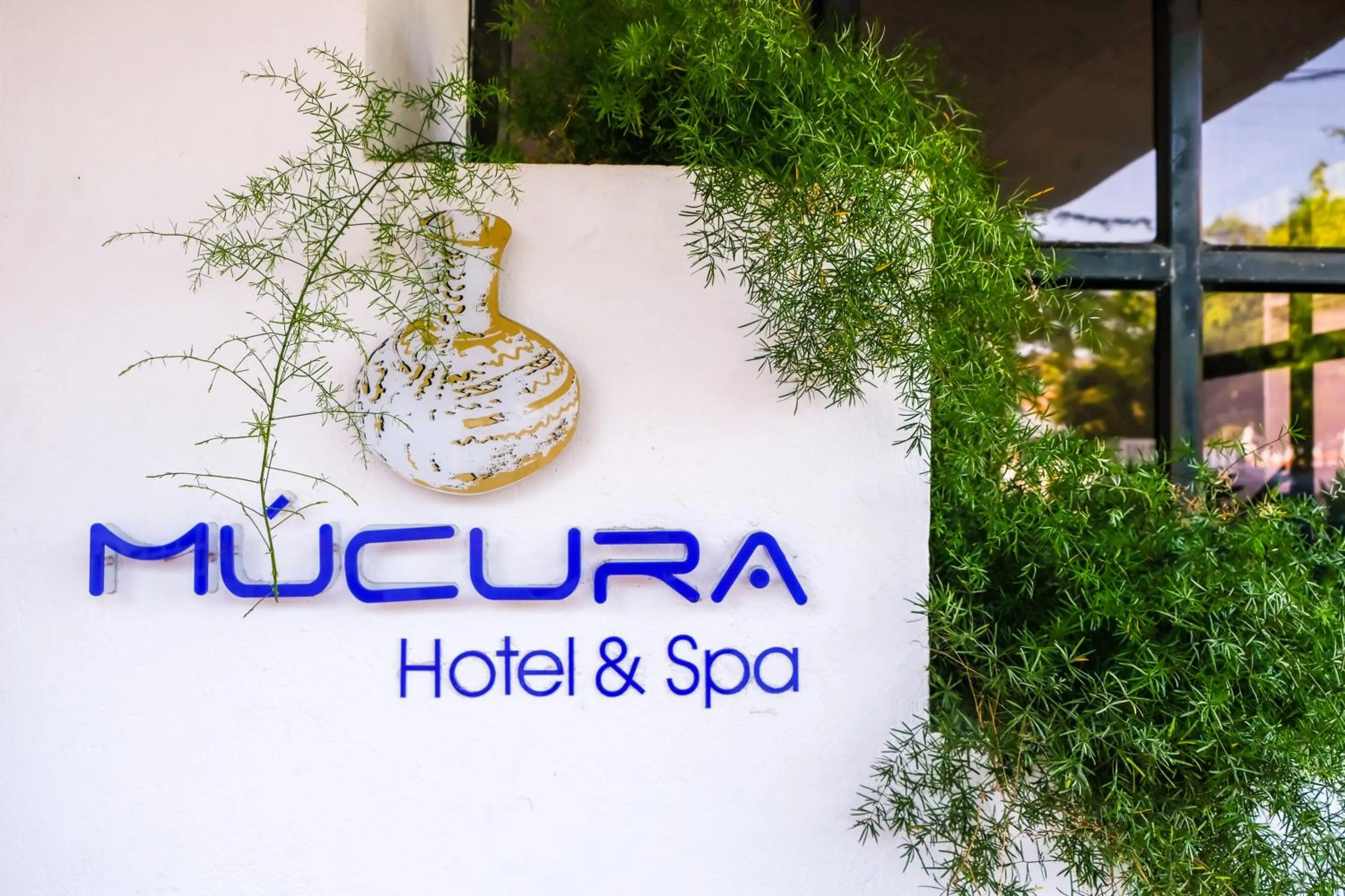Property logo or sign in Mucura Hotel & Spa