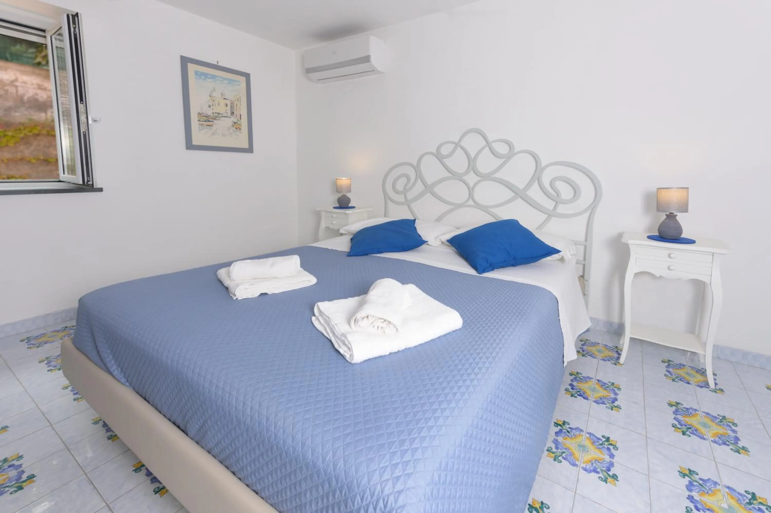 Bed in B&B Mediterraneo