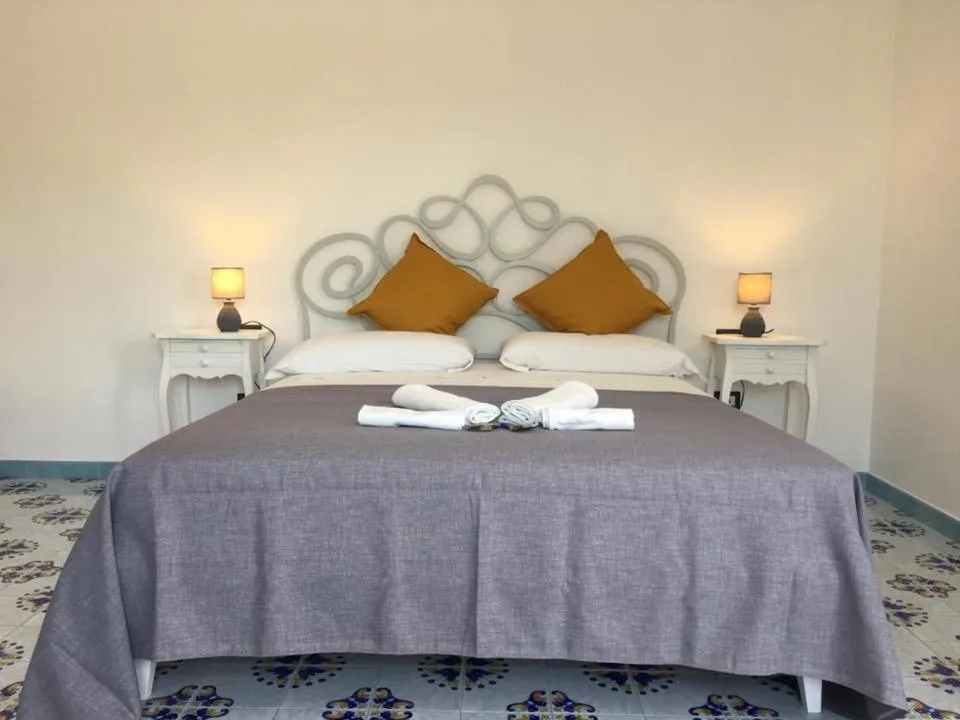 Bed in B&B Mediterraneo