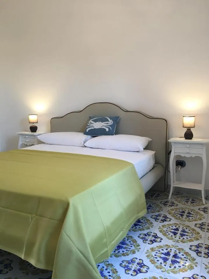 Bed in B&B Mediterraneo