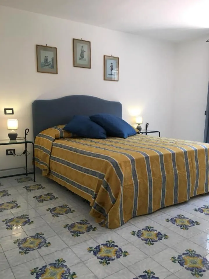 Bed in B&B Mediterraneo