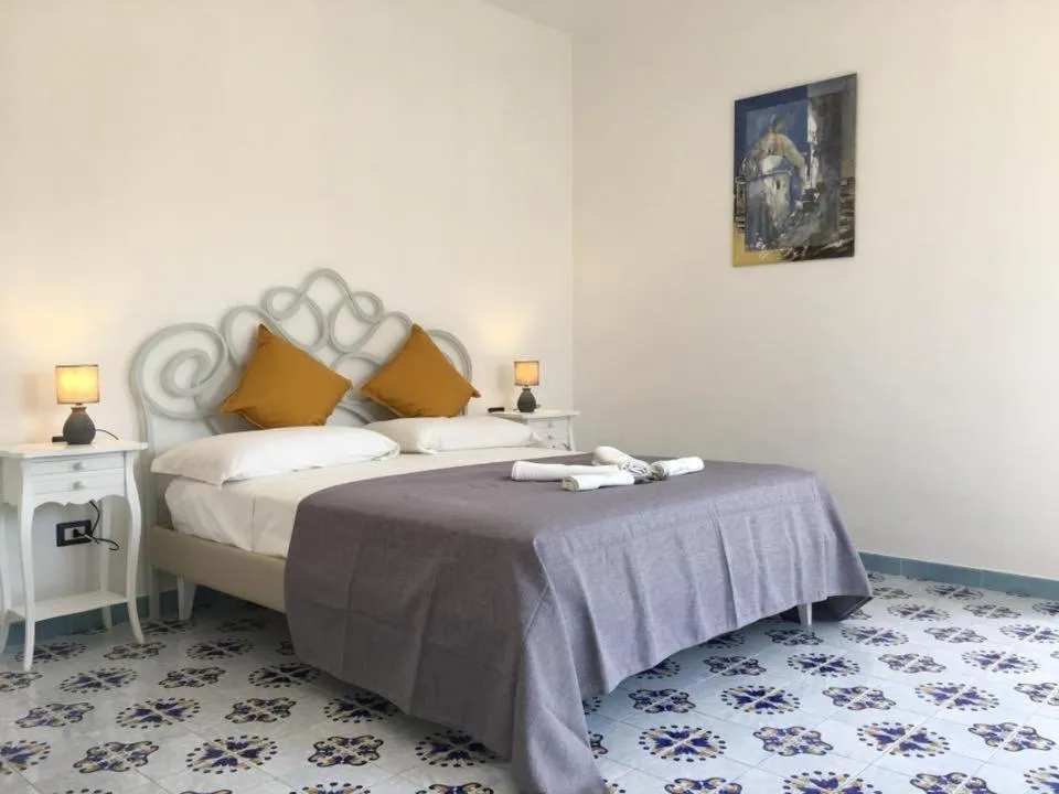 Bed in B&B Mediterraneo