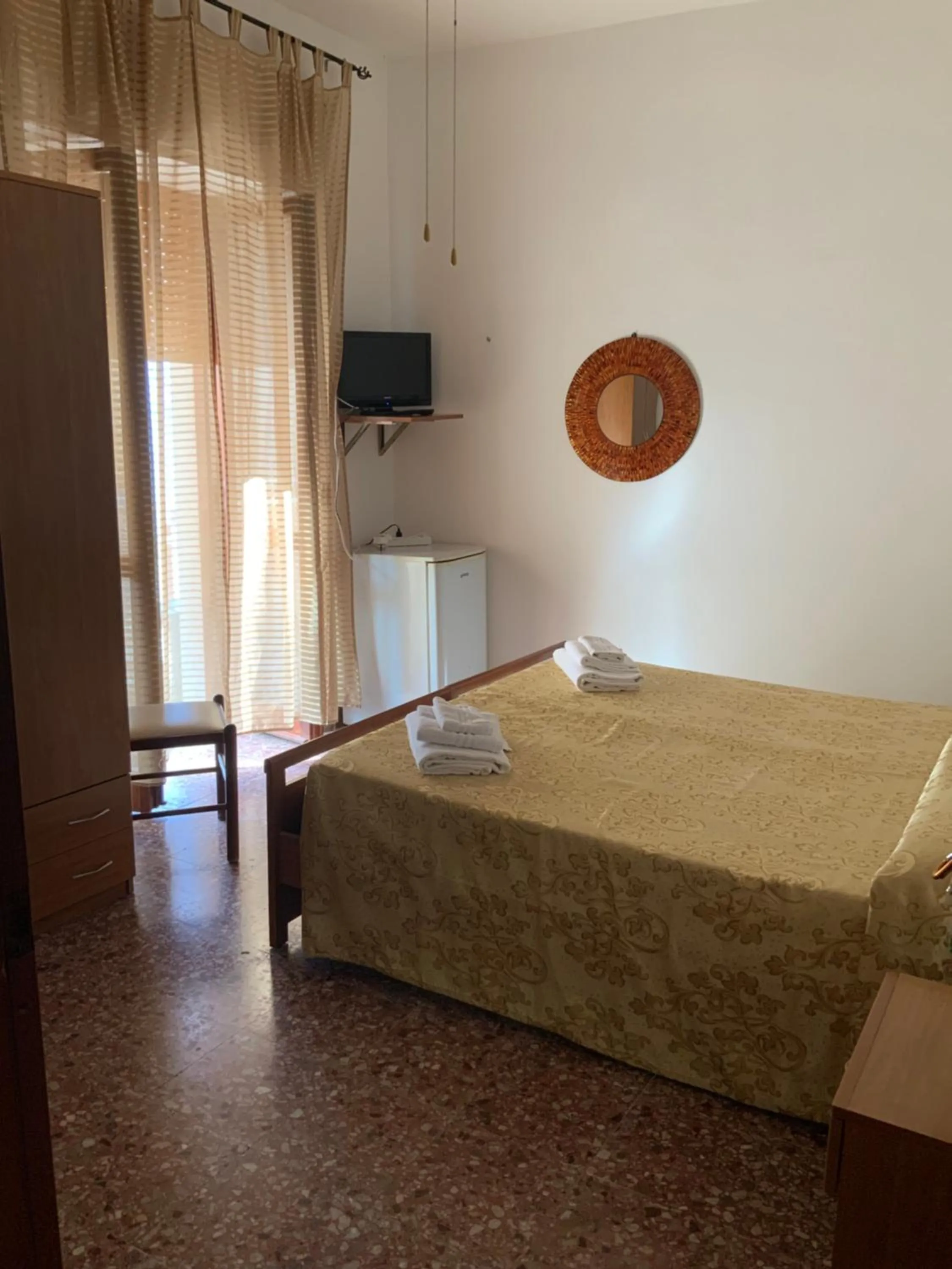 Bed in La Scogliera Bed & Breakfast