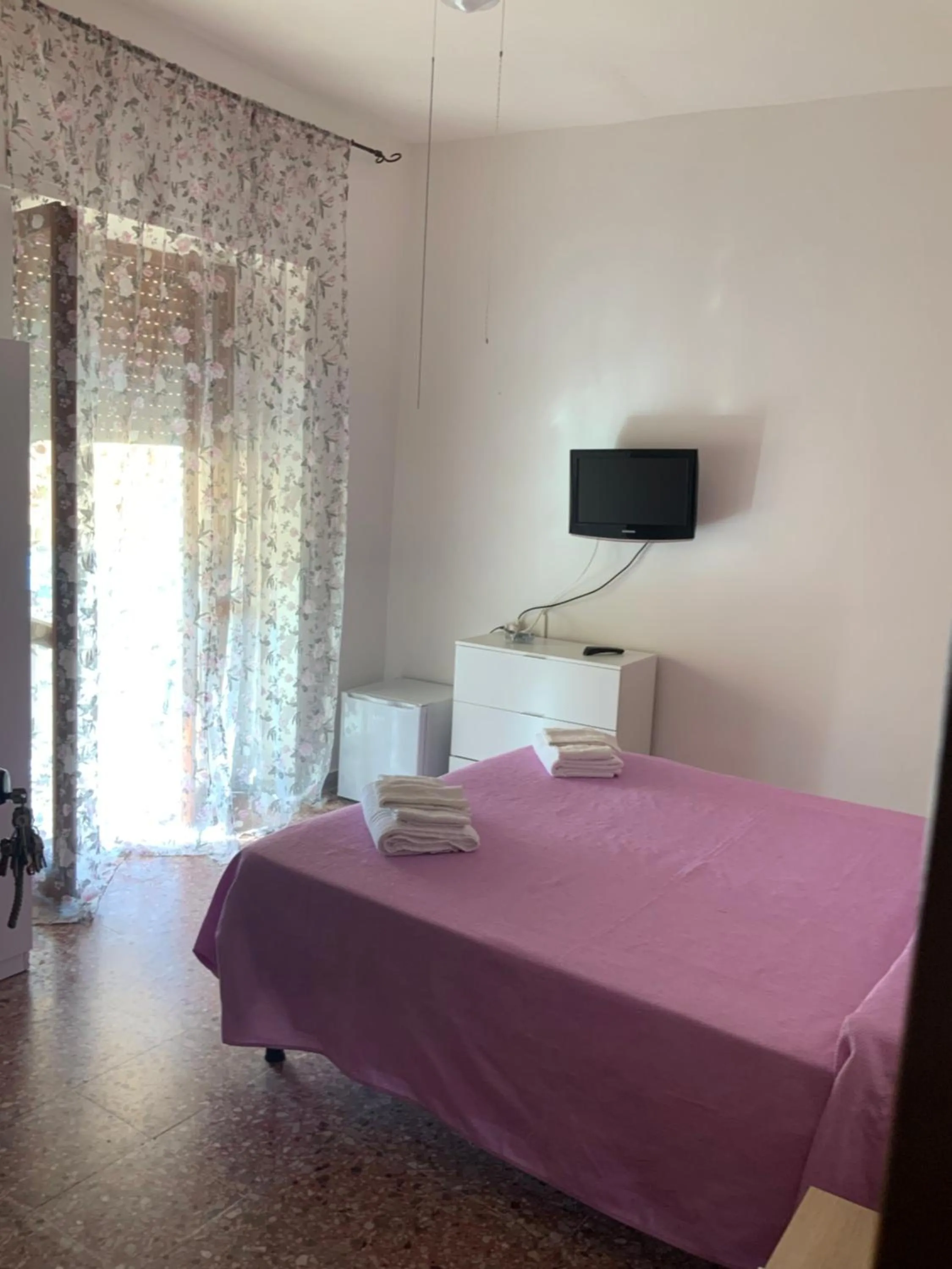 Bed in La Scogliera Bed & Breakfast