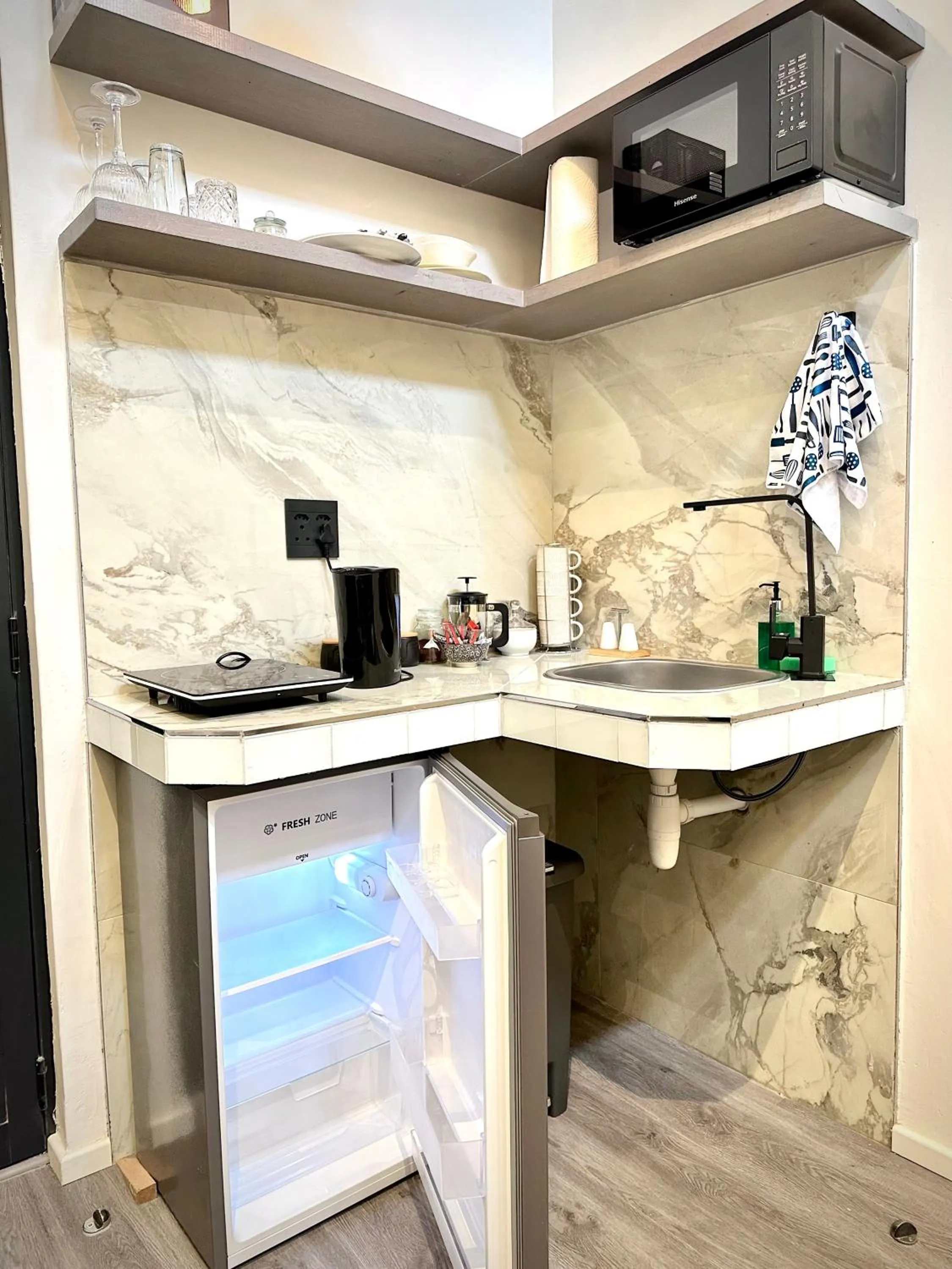 Kitchen or kitchenette in Spacube Luxury Suites and Spa