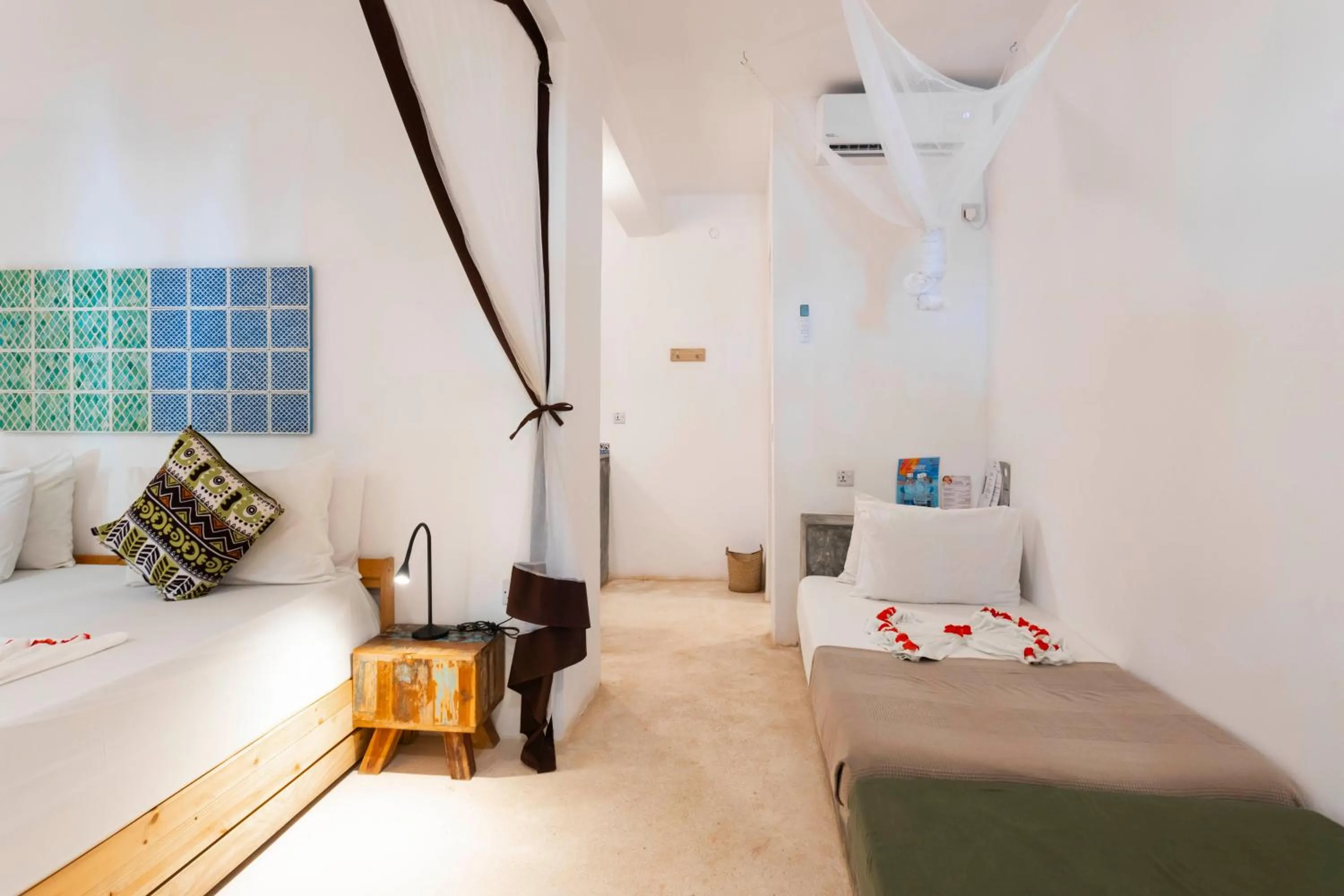 Seating area, Bed in Fun Beach Hotel