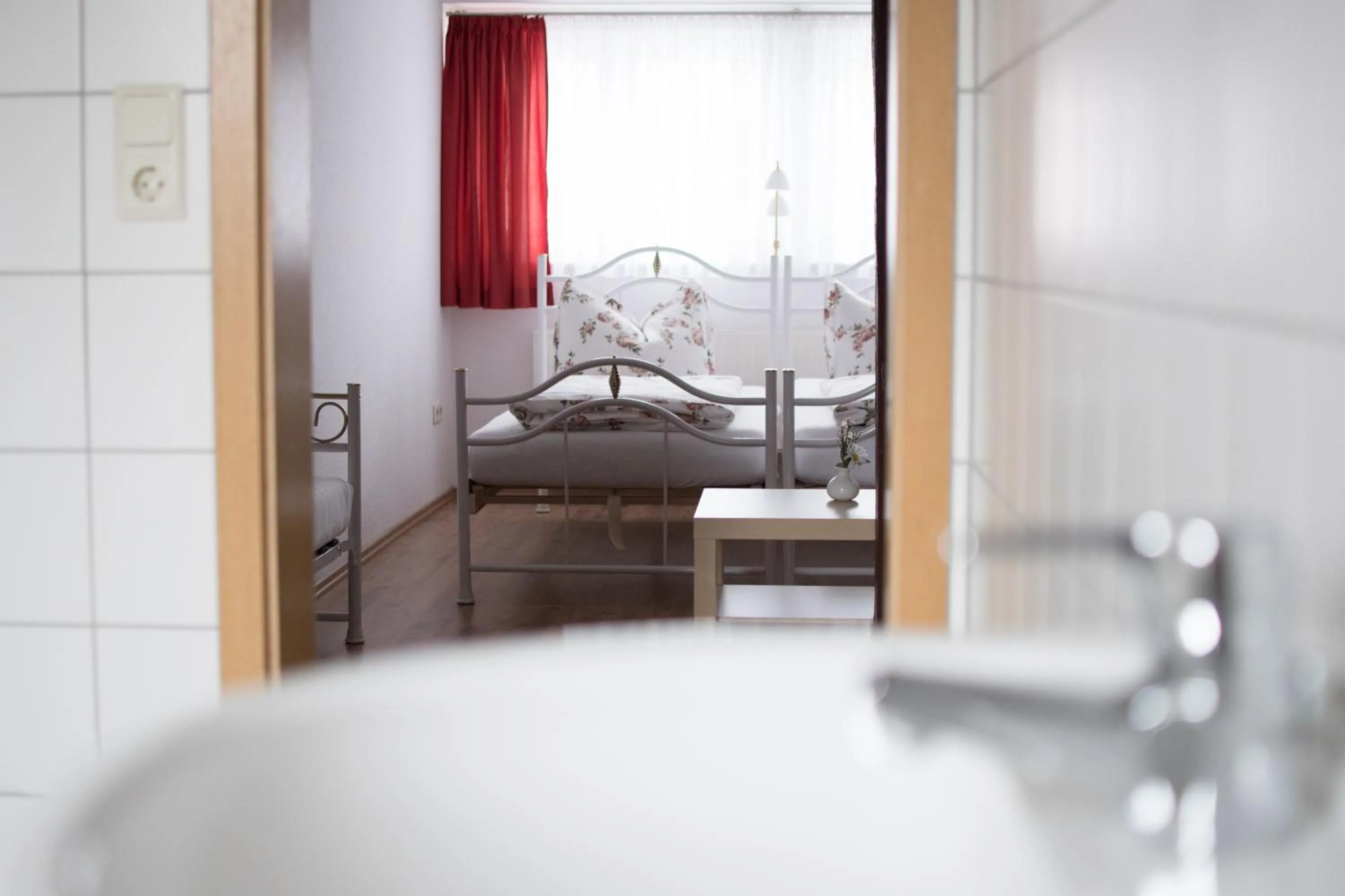 Decorative detail, Bed in Pension Regina - Inh. Monique Kluge