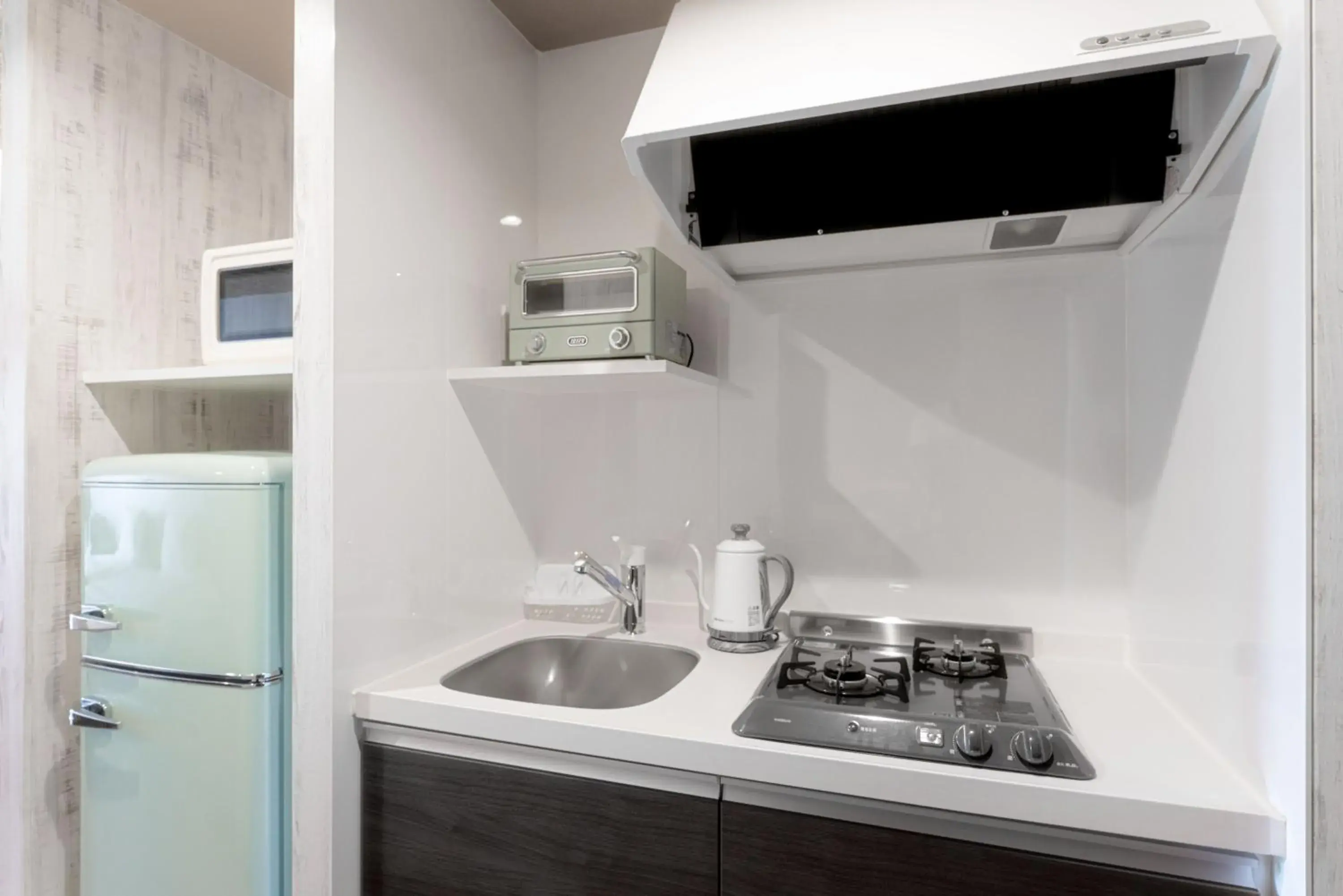 Kitchen or kitchenette in Palm Springs Miyakojima Resort Kitchen or kitchenette in Palm Springs Miyakojima Resort