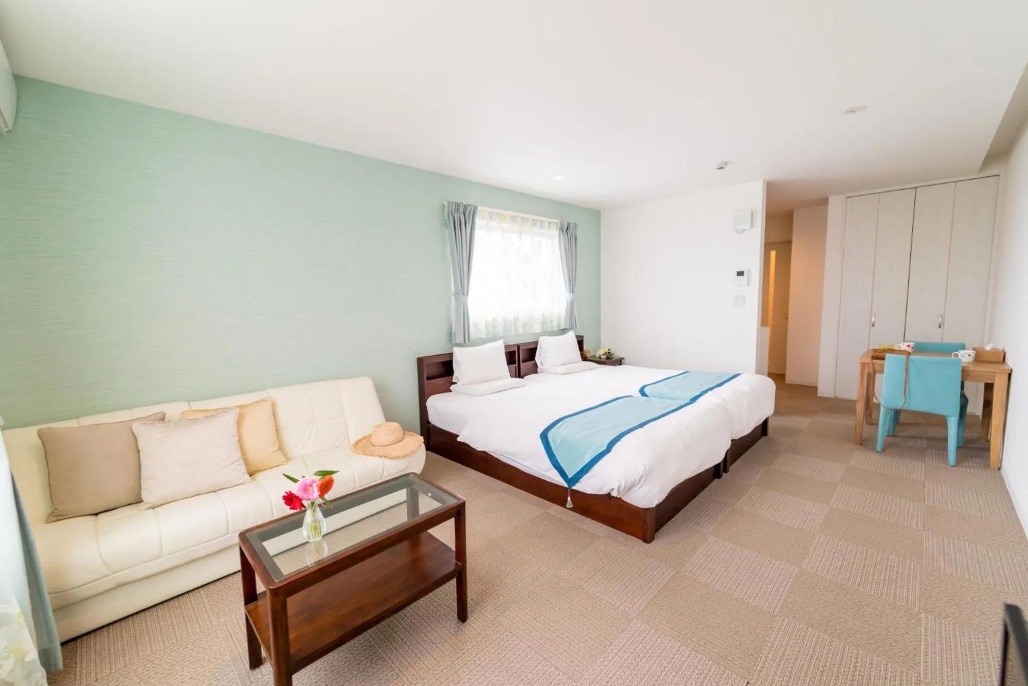 Bed in Palm Springs Miyakojima Resort