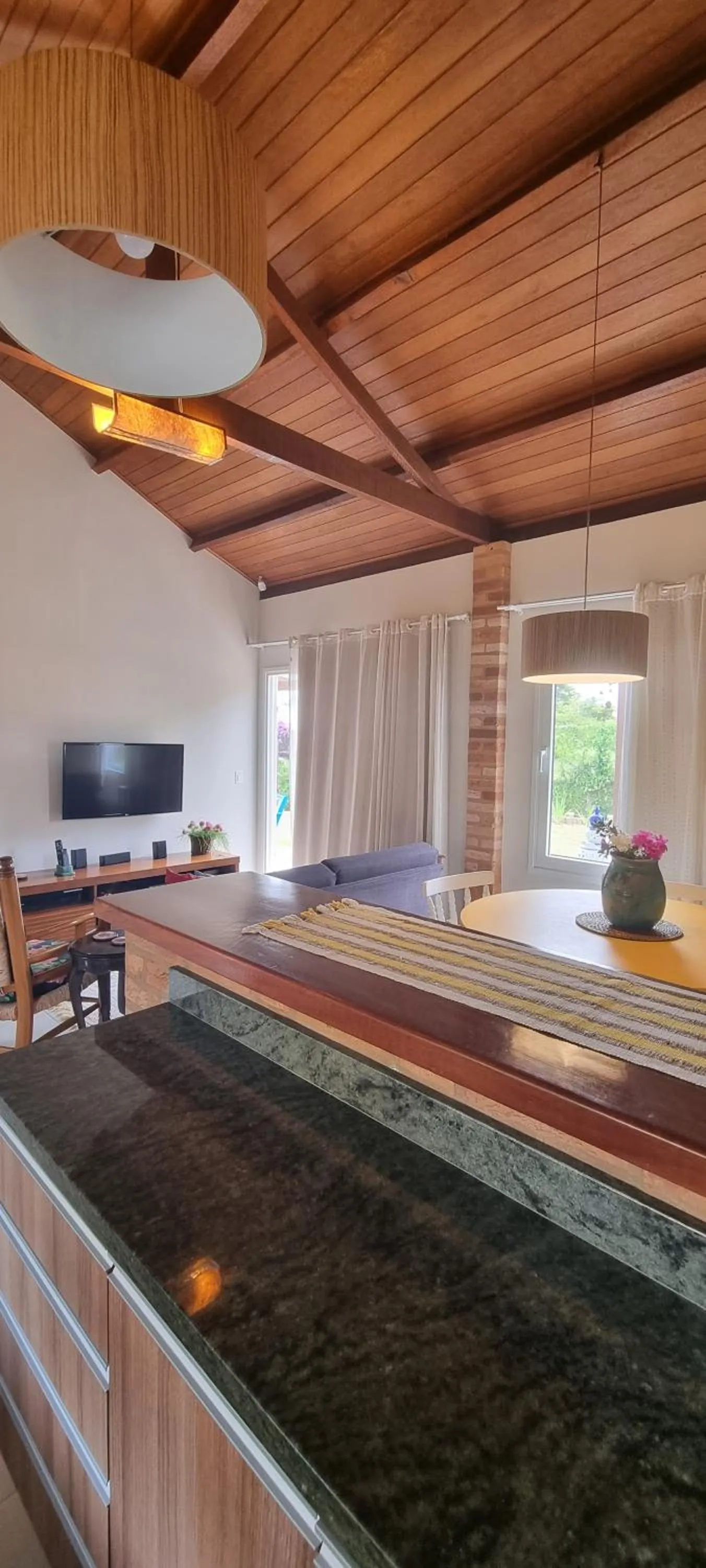 Communal lounge/ TV room in Pouso Mantiqueira