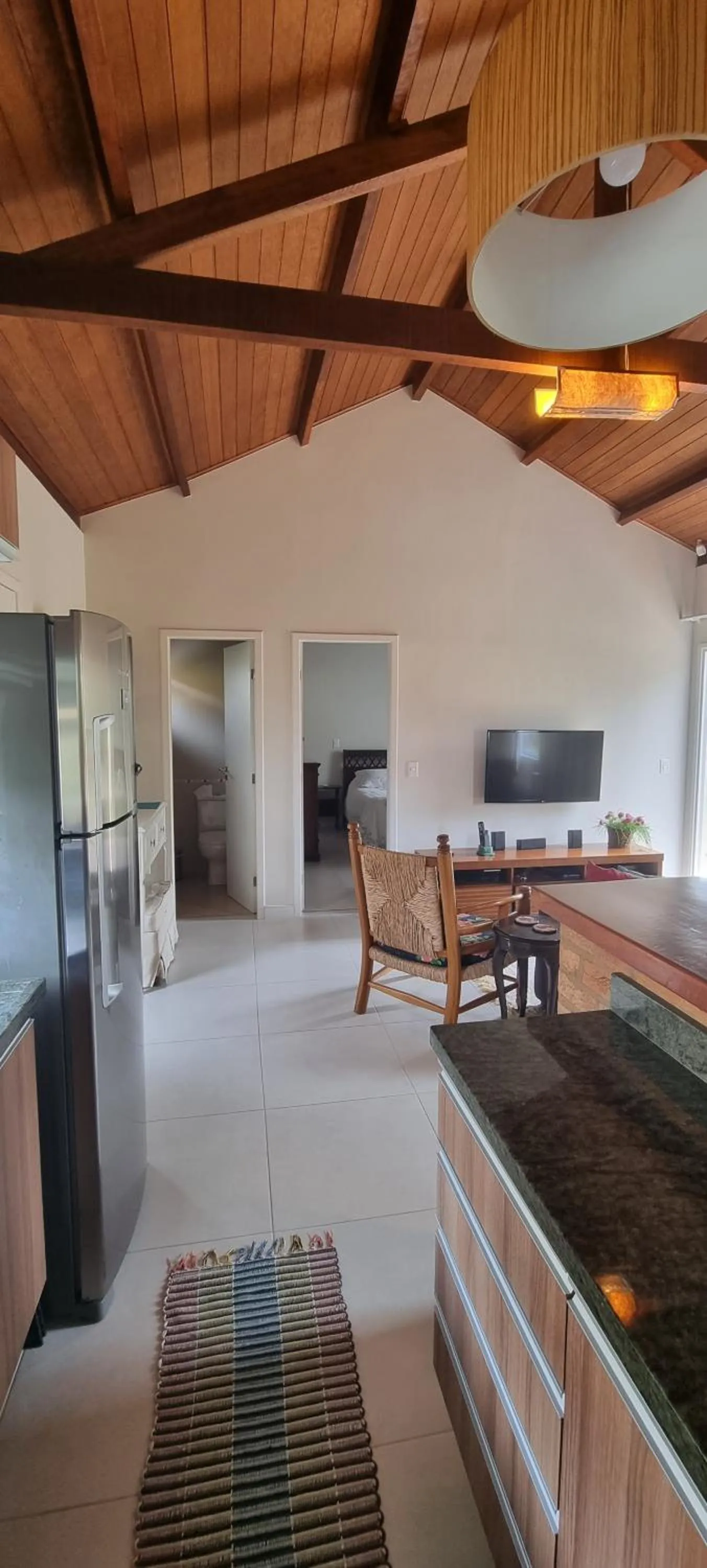 Communal lounge/ TV room in Pouso Mantiqueira