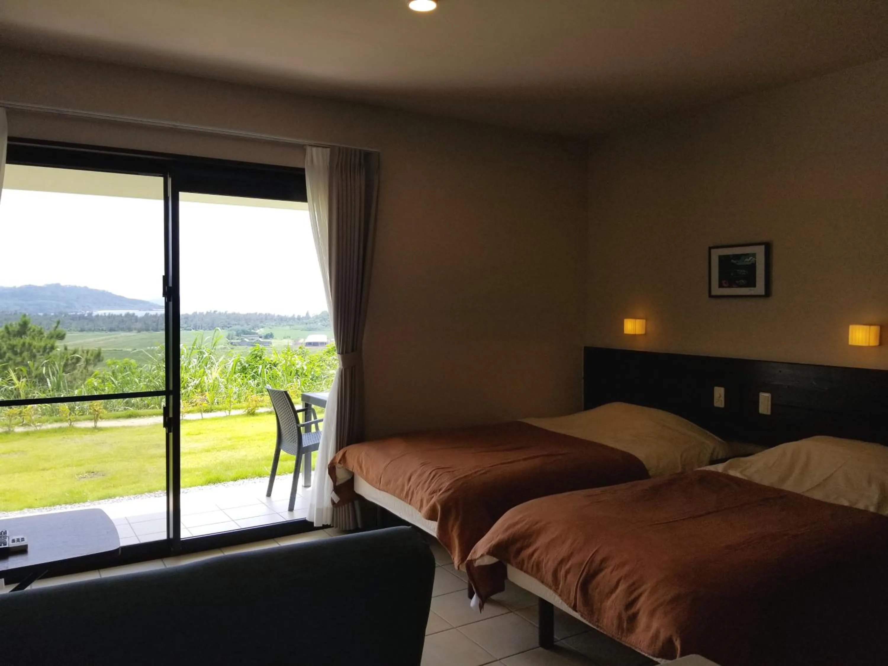 Dining area, Bed in terrace IRIOMOTEJIMA CONDOMINIUM