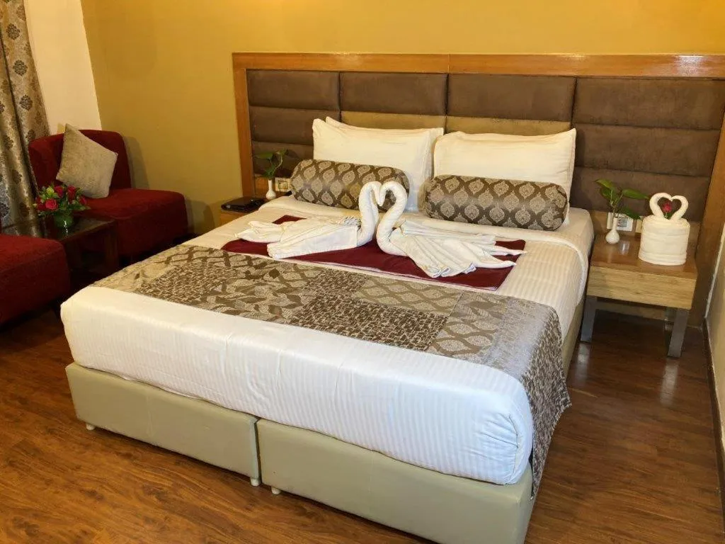 Bedroom, Bed in Hotel Ramanashree Richmond