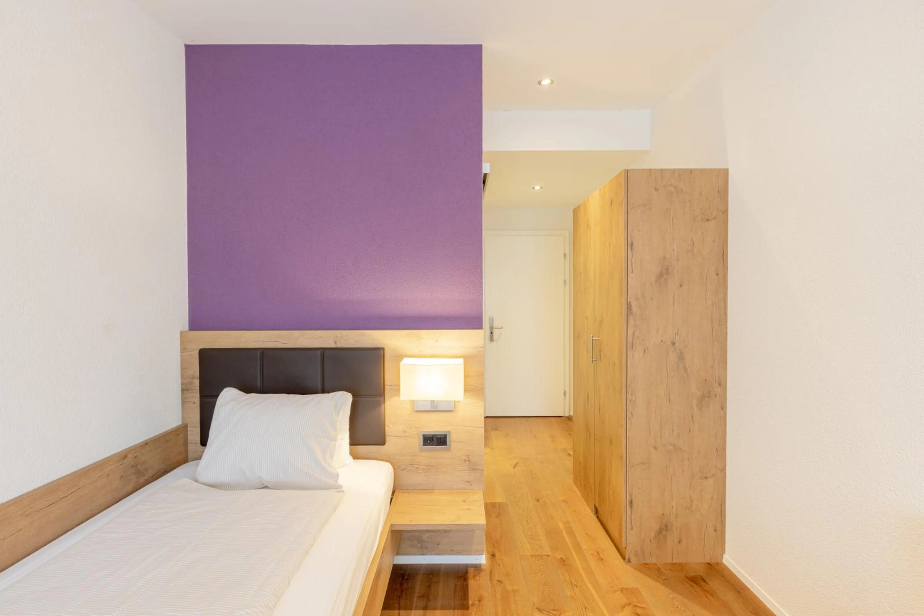 Photo of the whole room, Bed in Hotel Flamatt