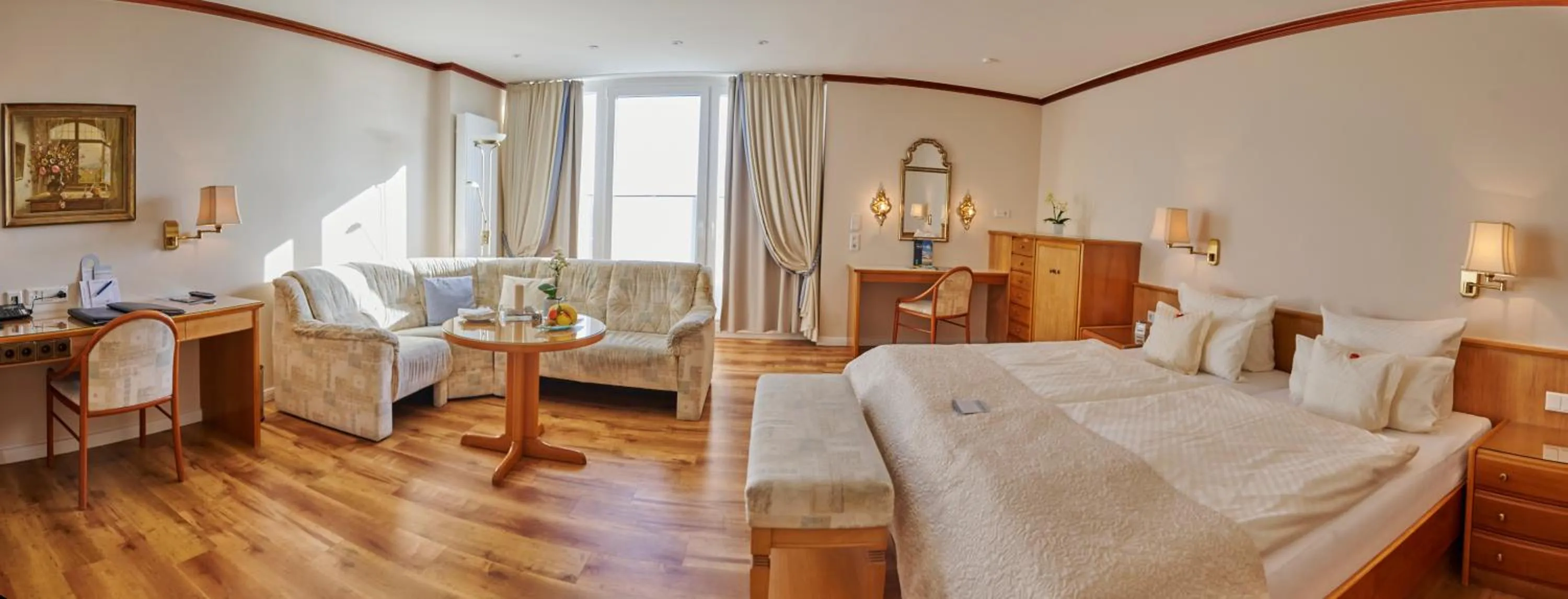 Living room, Bed in Badhotel Sternhagen