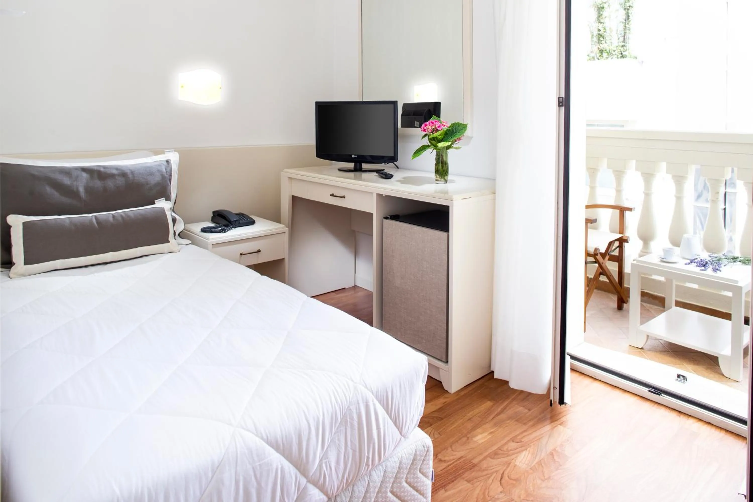 Bed in Novecento Suite Hotel