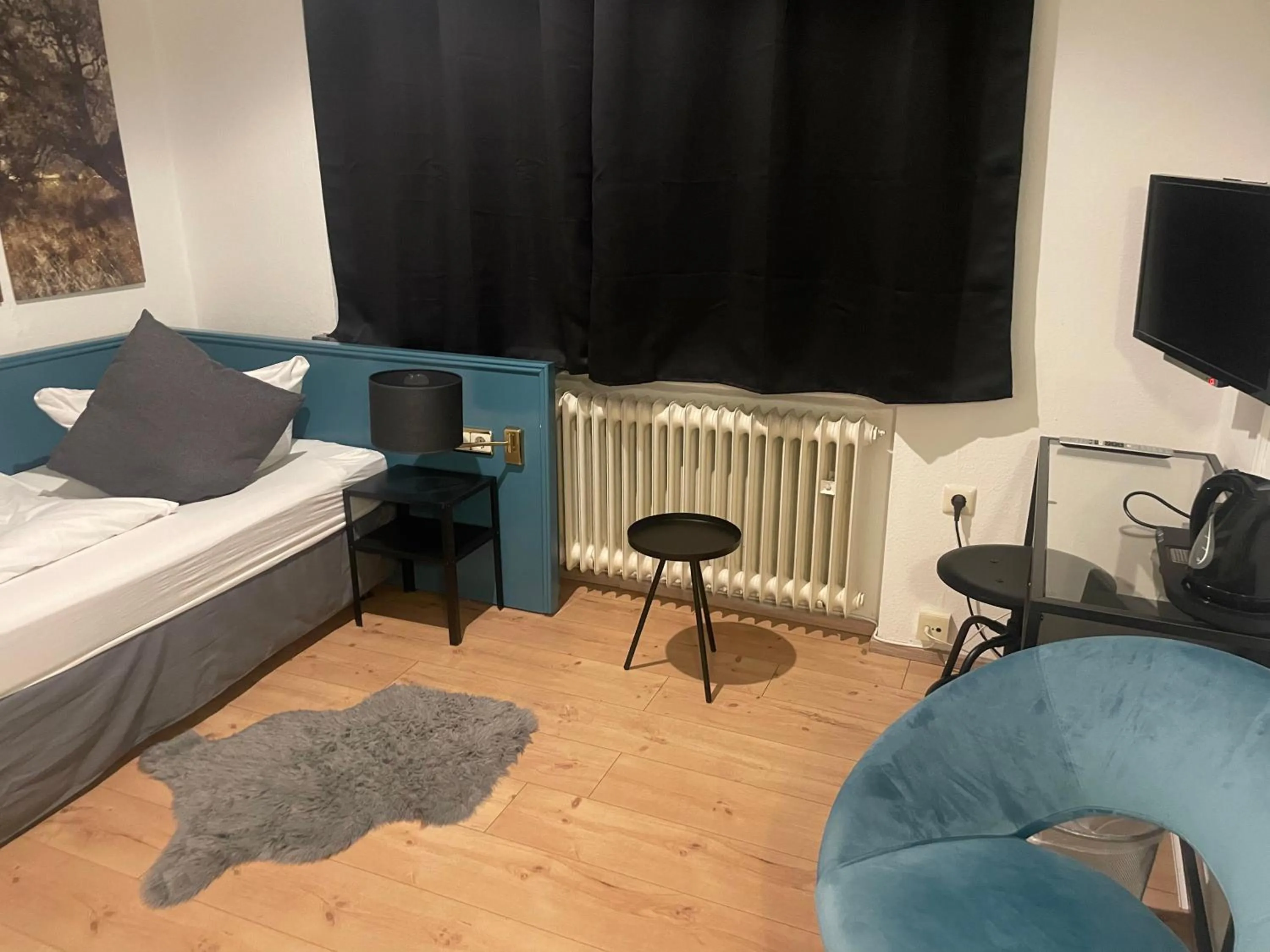 Photo of the whole room, Bed in Berghotel HARZ