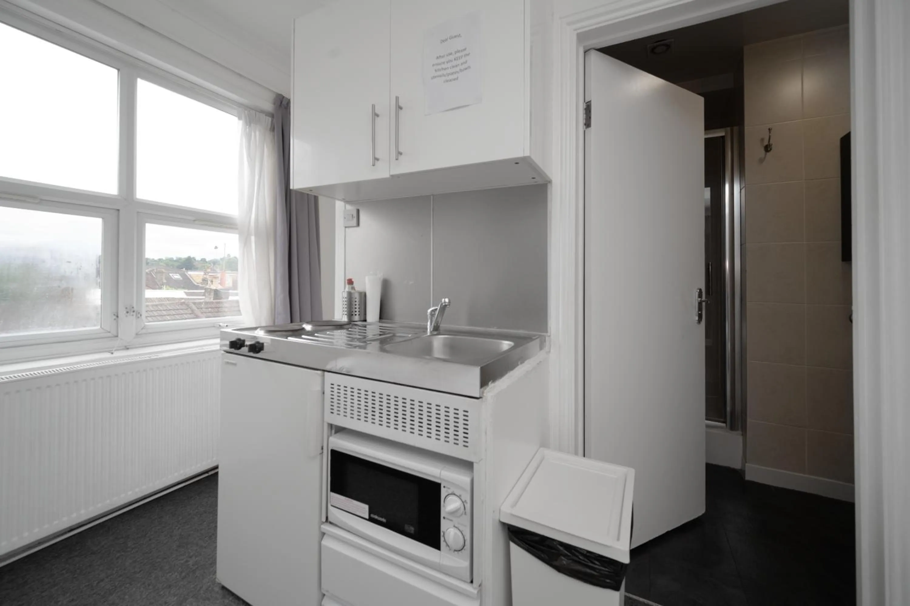 Kitchen or kitchenette in Flexistay Tulsi Aparthotel