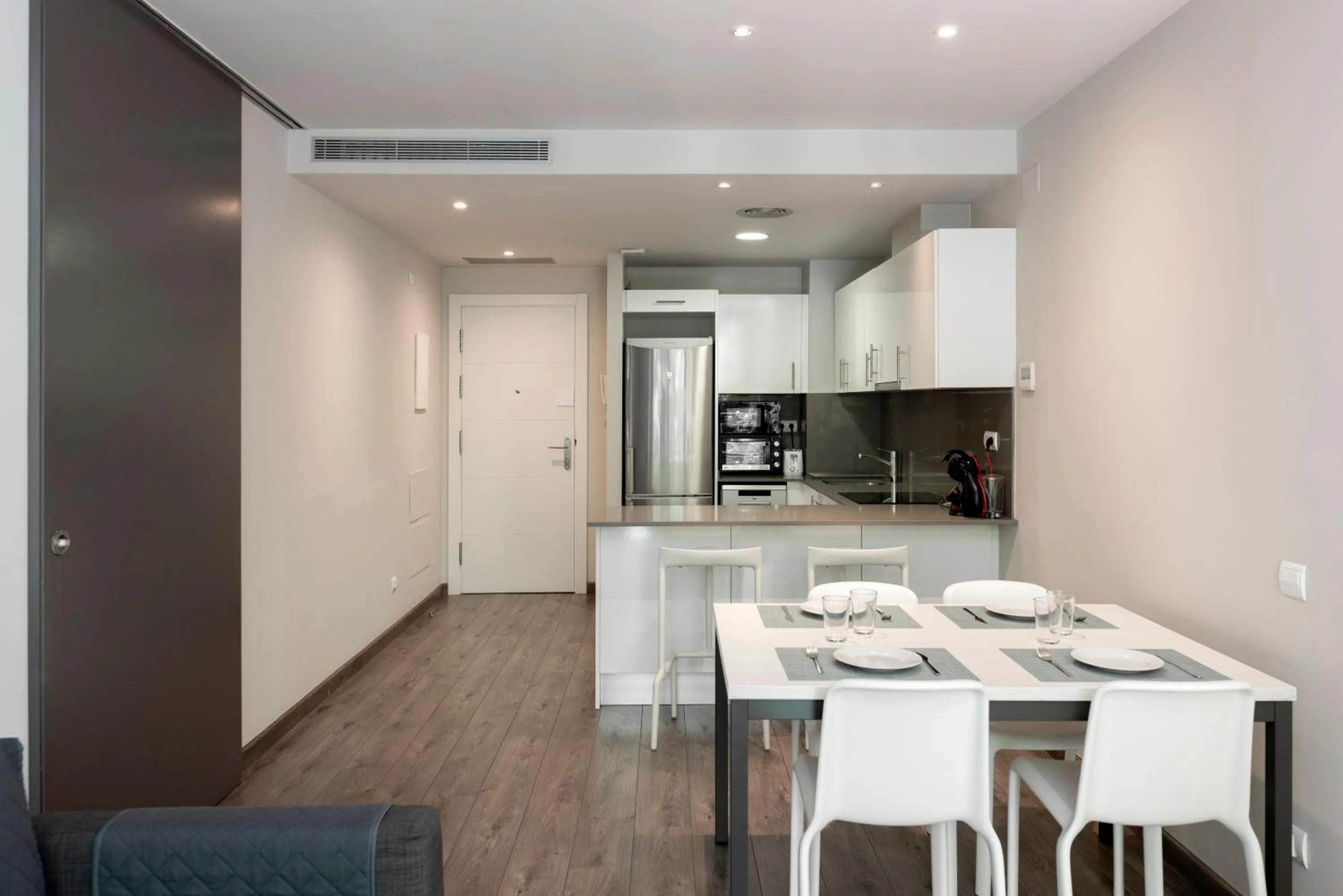 Kitchen or kitchenette in Espais Blaus Apartments