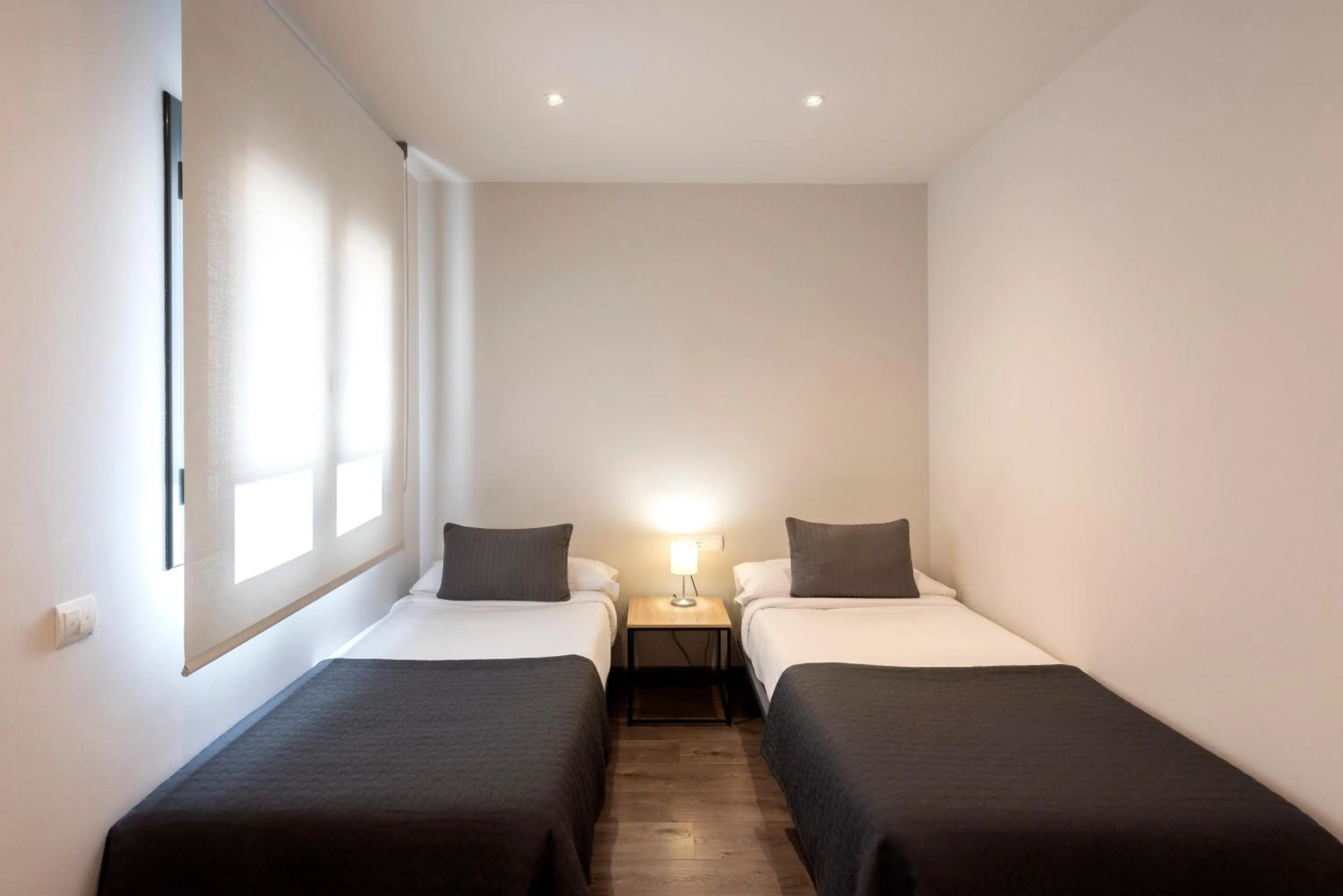 Bed in Espais Blaus Apartments