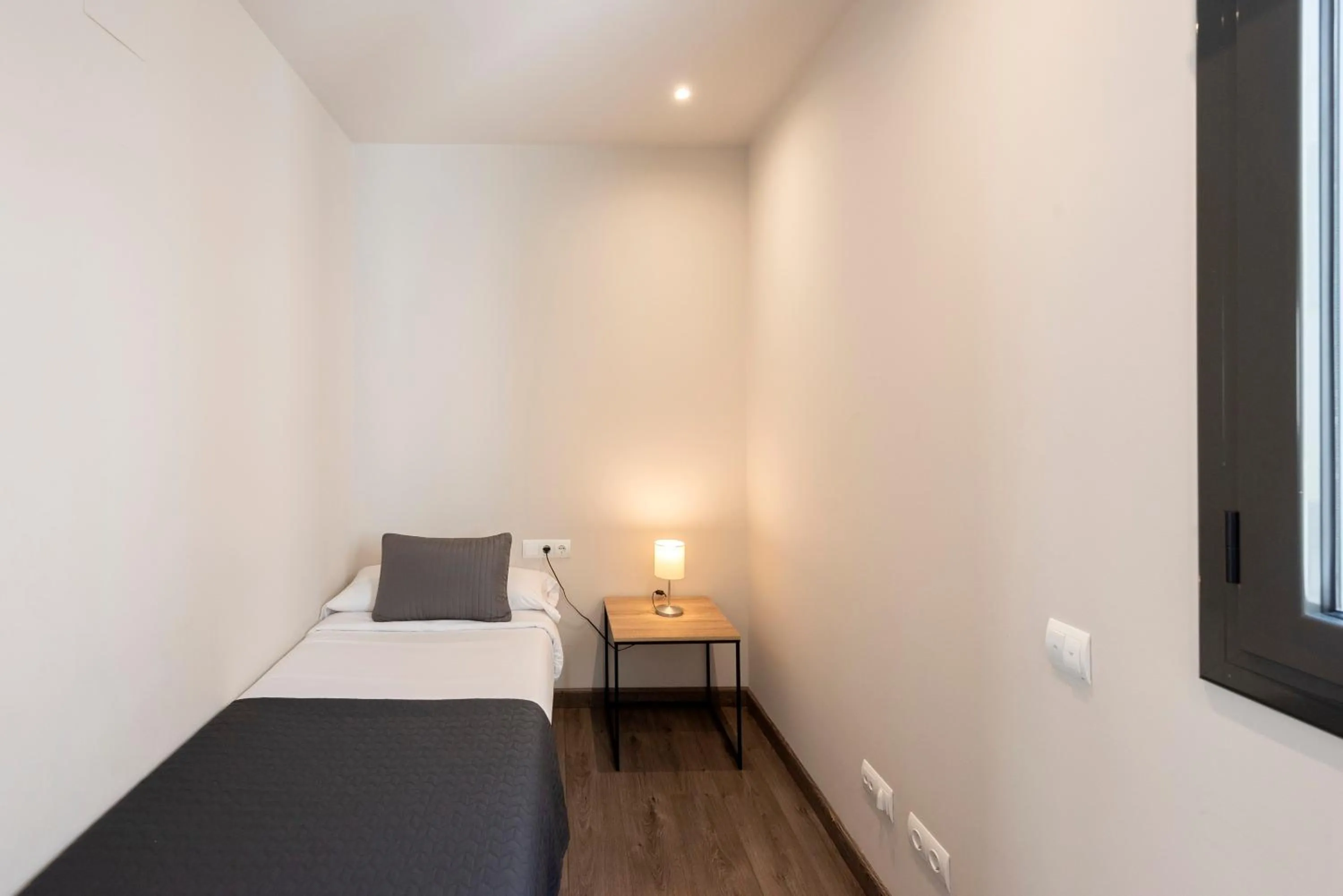 Bed in Espais Blaus Apartments