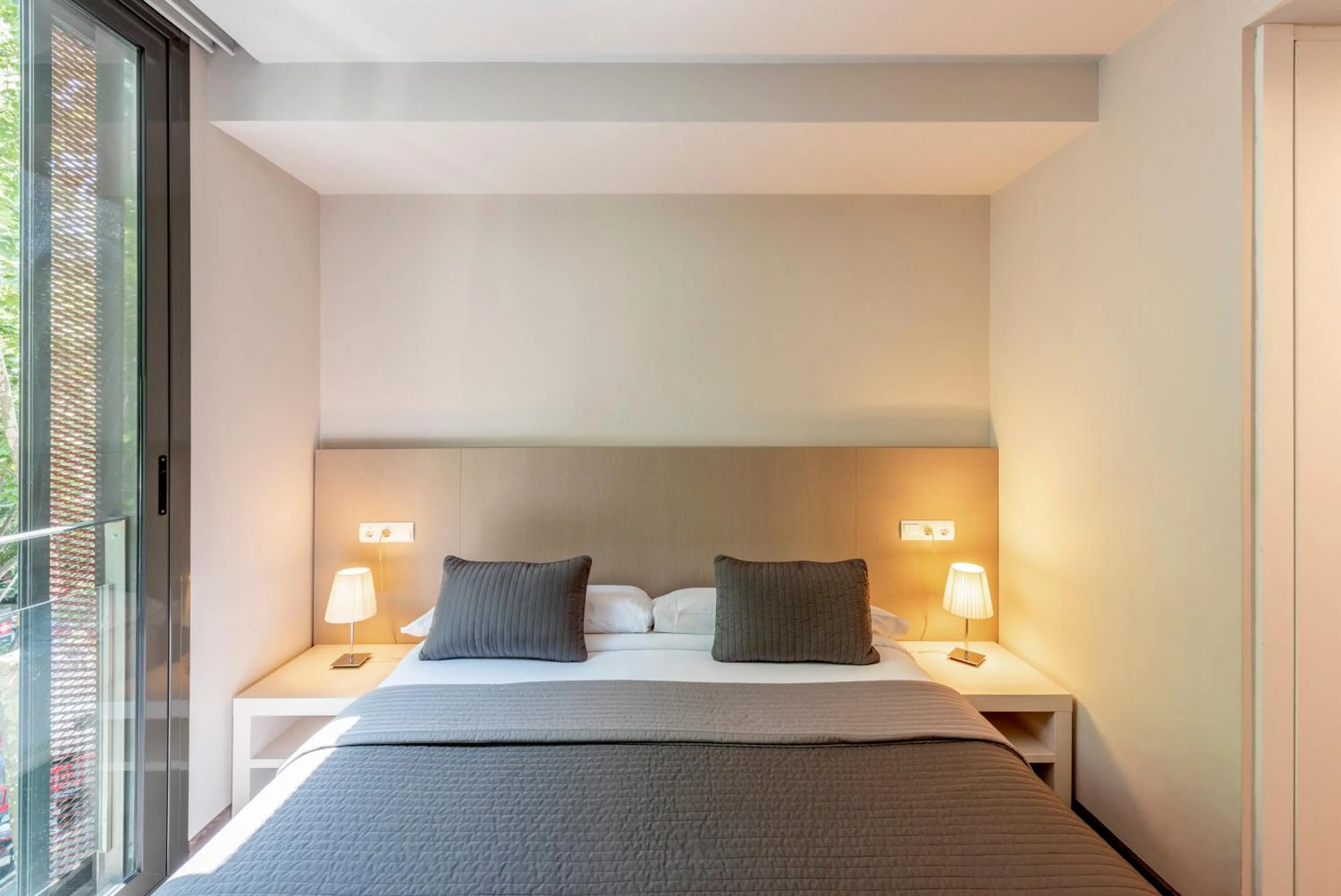 Bed in Espais Blaus Apartments