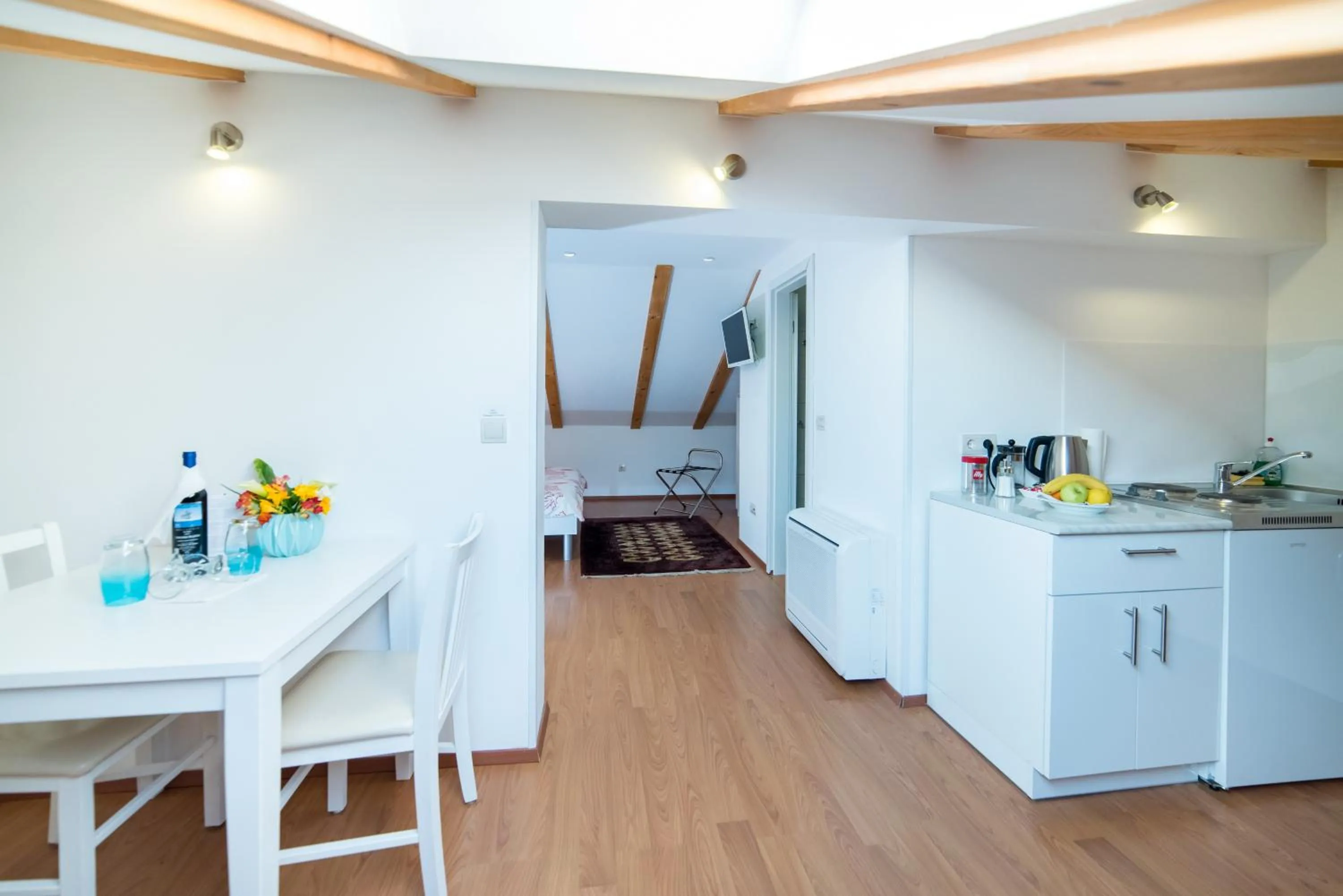 Kitchen or kitchenette in Rooms Raič