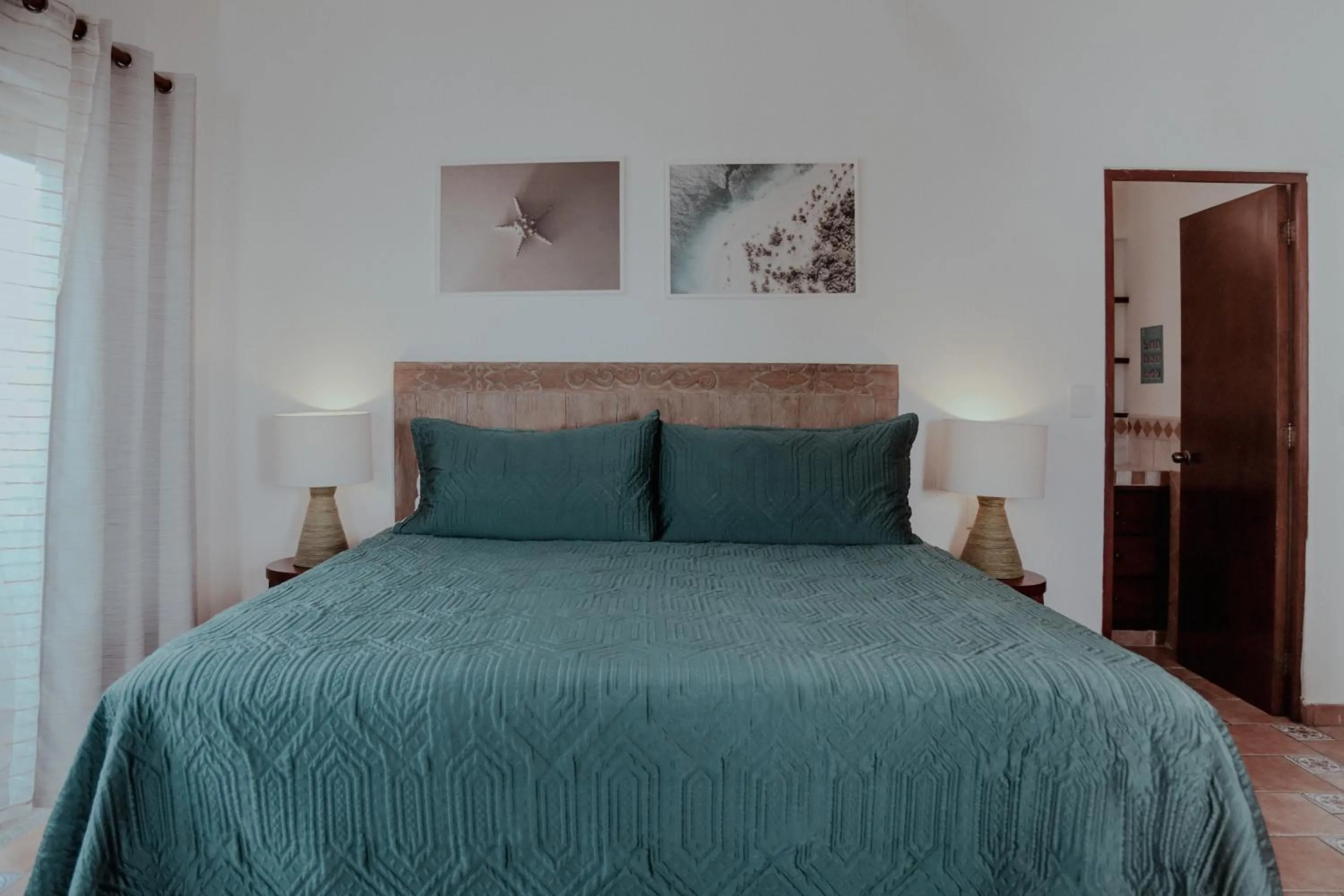 Bed in Fabiola Condo Hotel