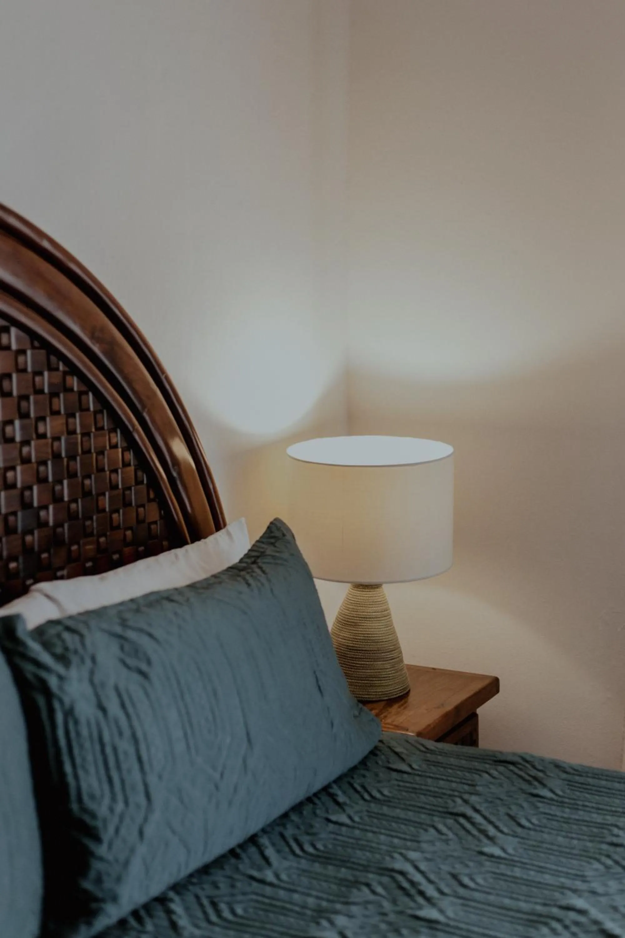 Bed in Fabiola Condo Hotel