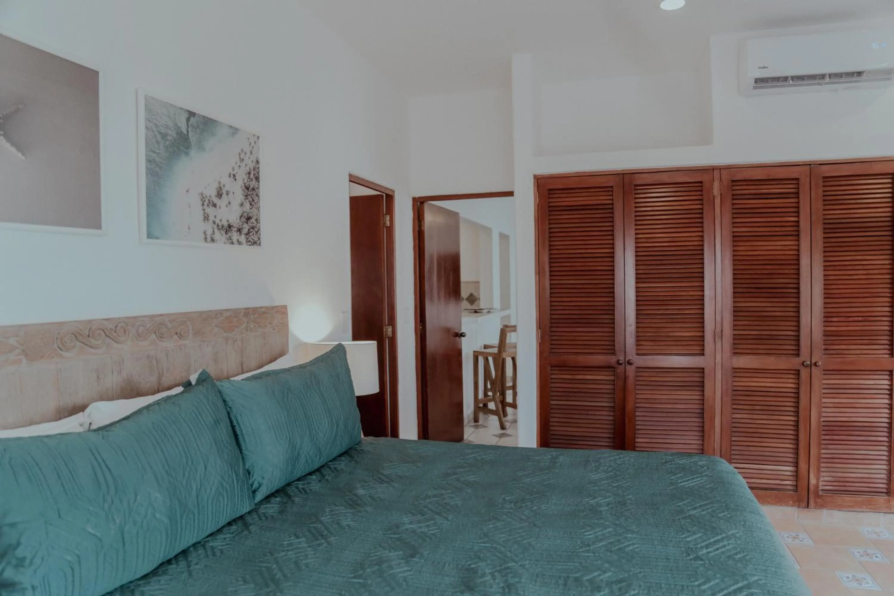 Bed in Fabiola Condo Hotel