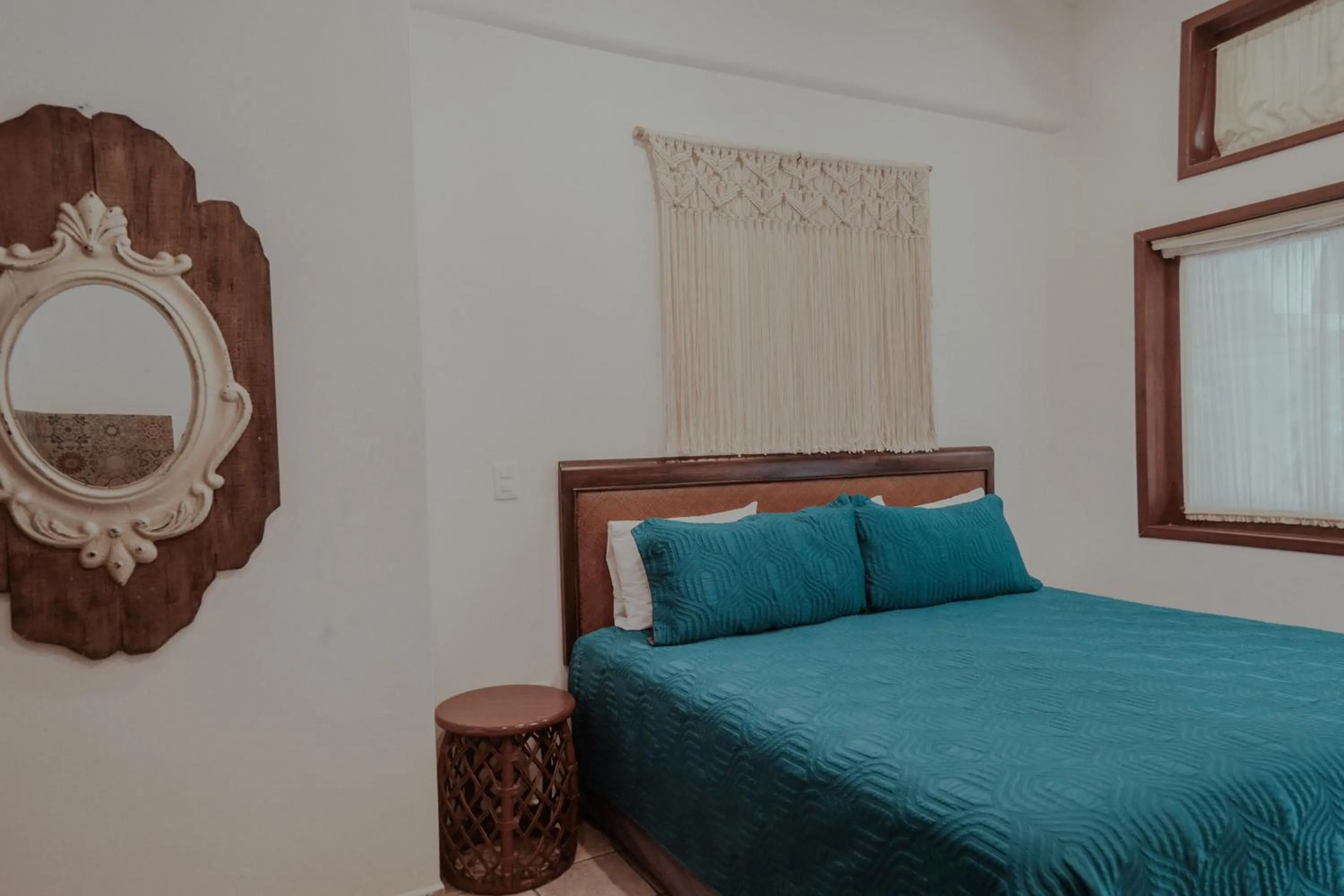 Bed in Fabiola Condo Hotel