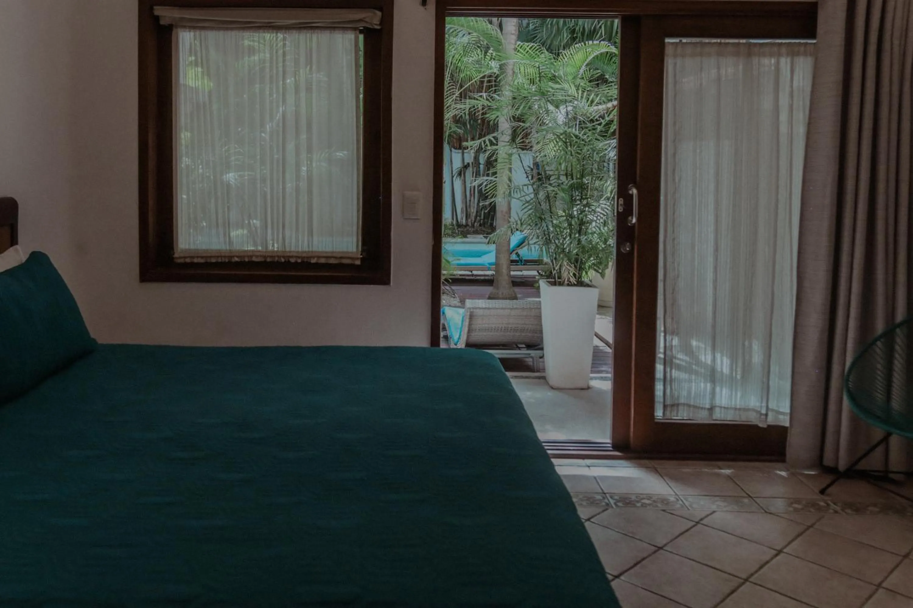 Bed in Fabiola Condo Hotel