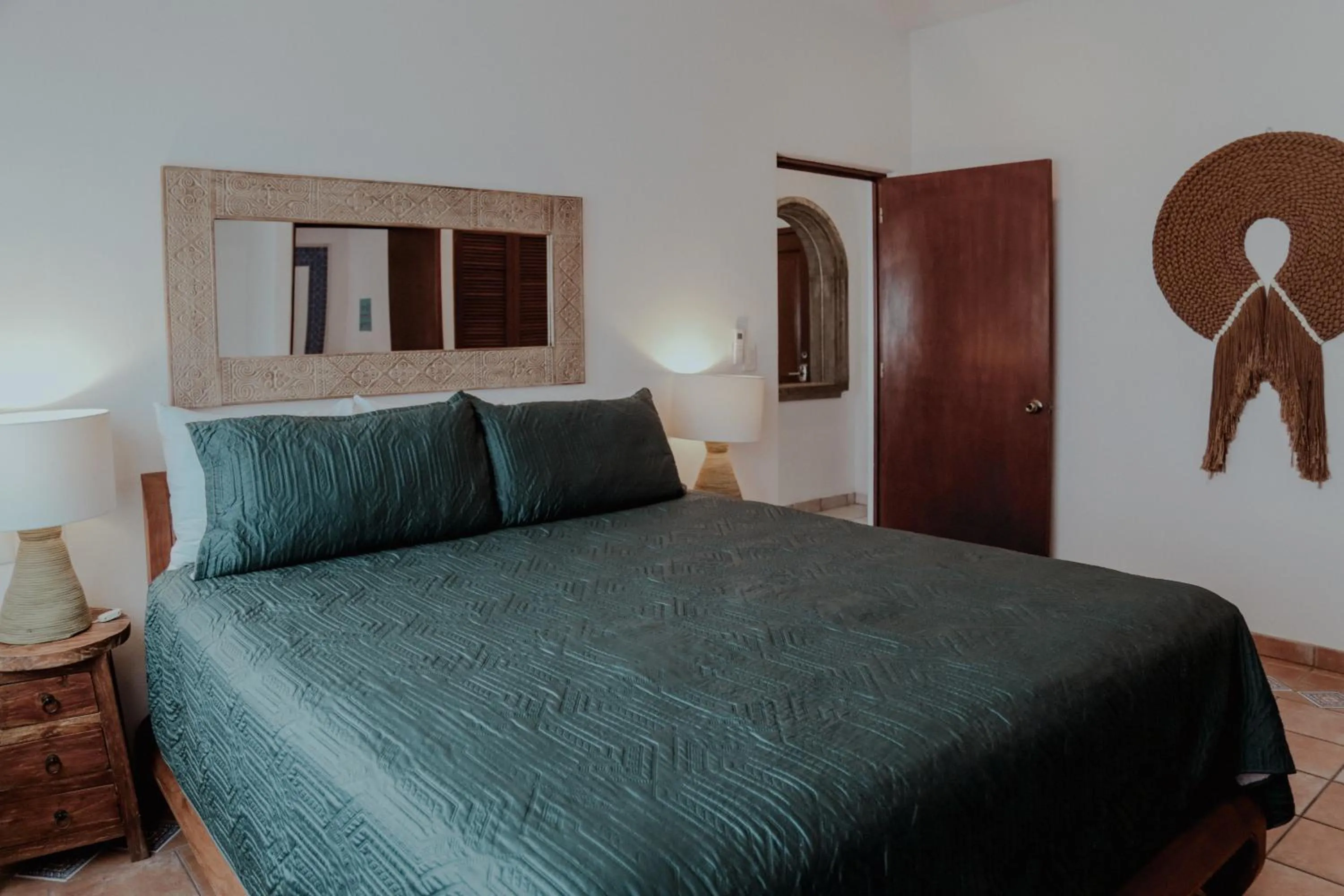 Bed in Fabiola Condo Hotel