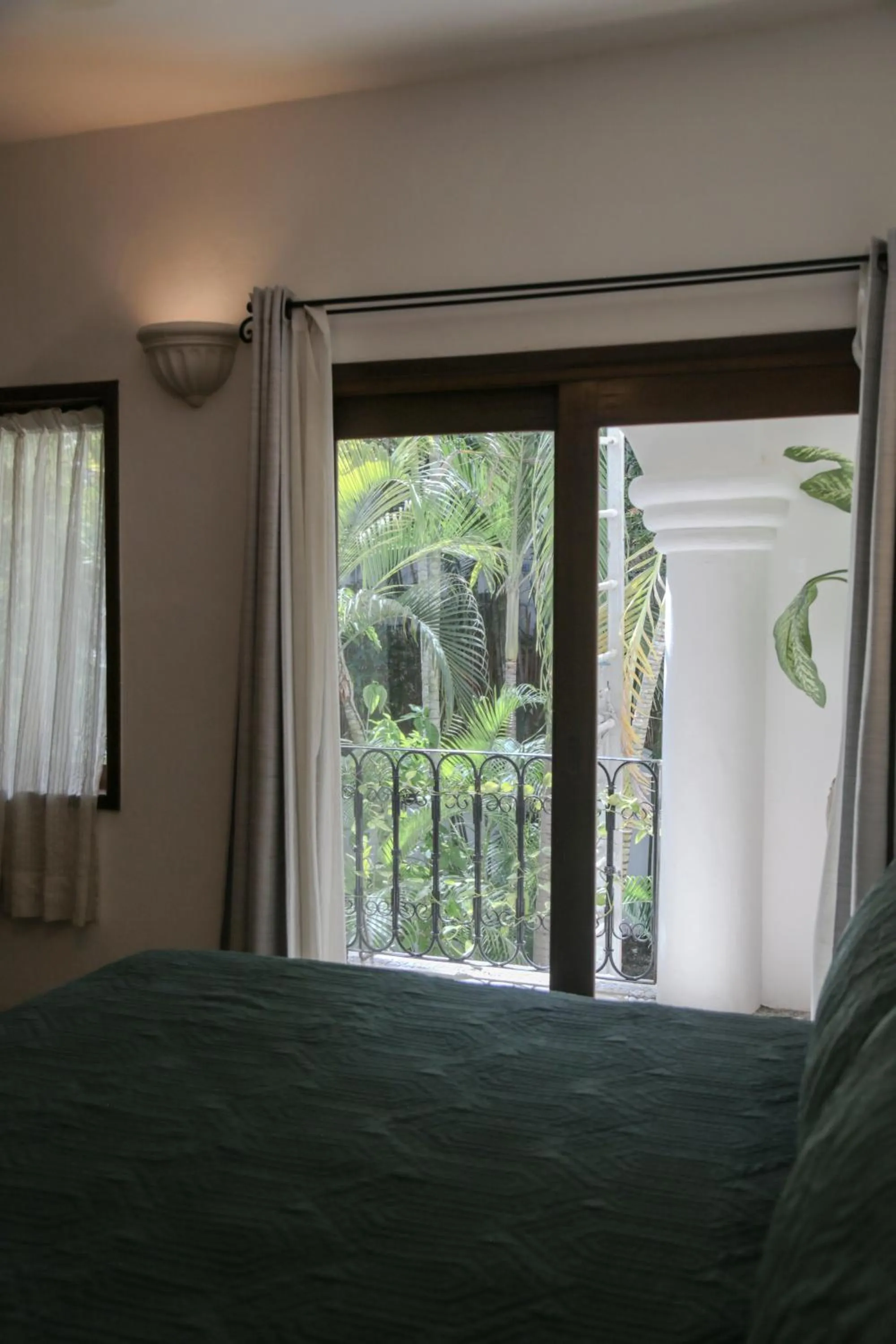 Bed in Fabiola Condo Hotel