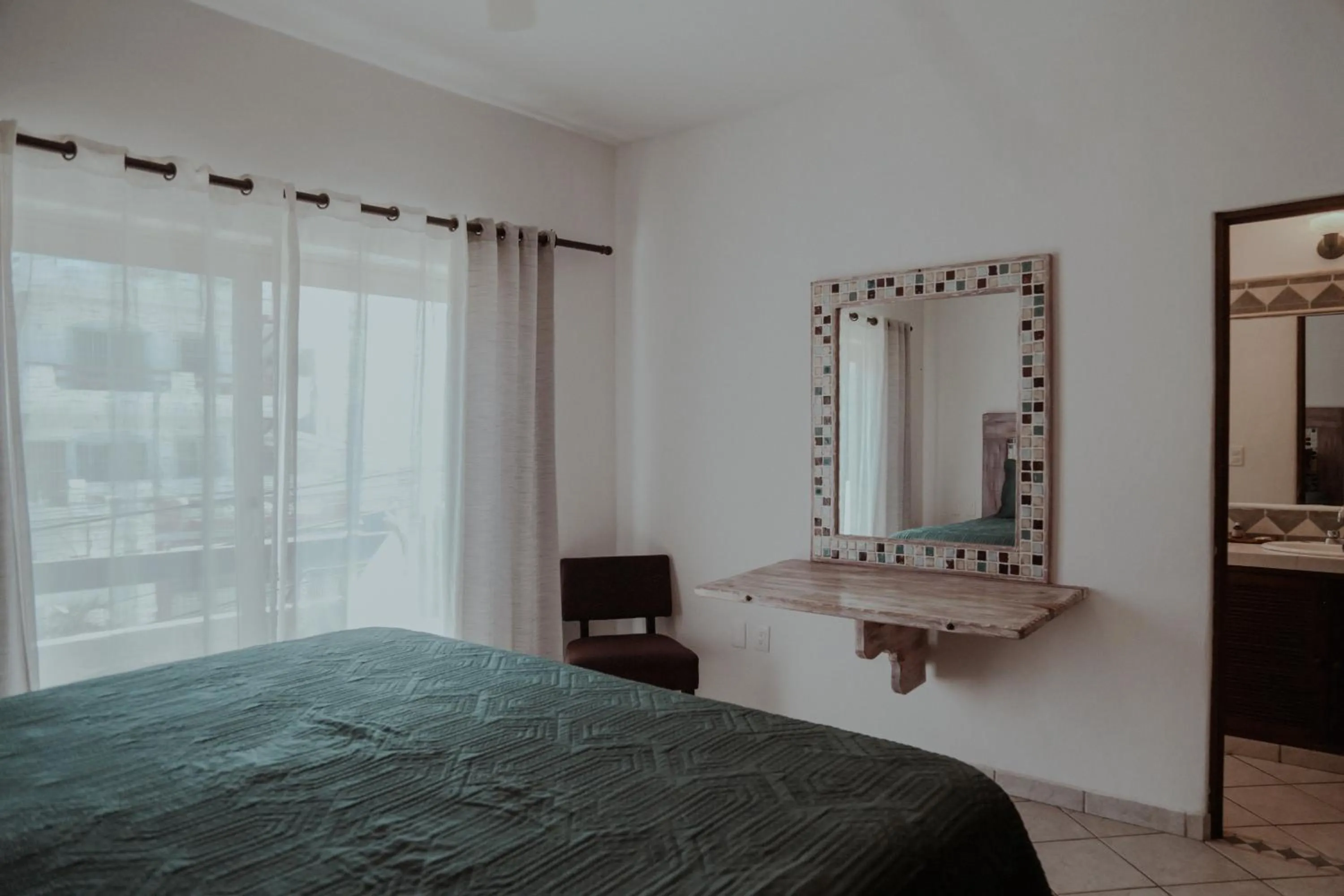 Bed in Fabiola Condo Hotel