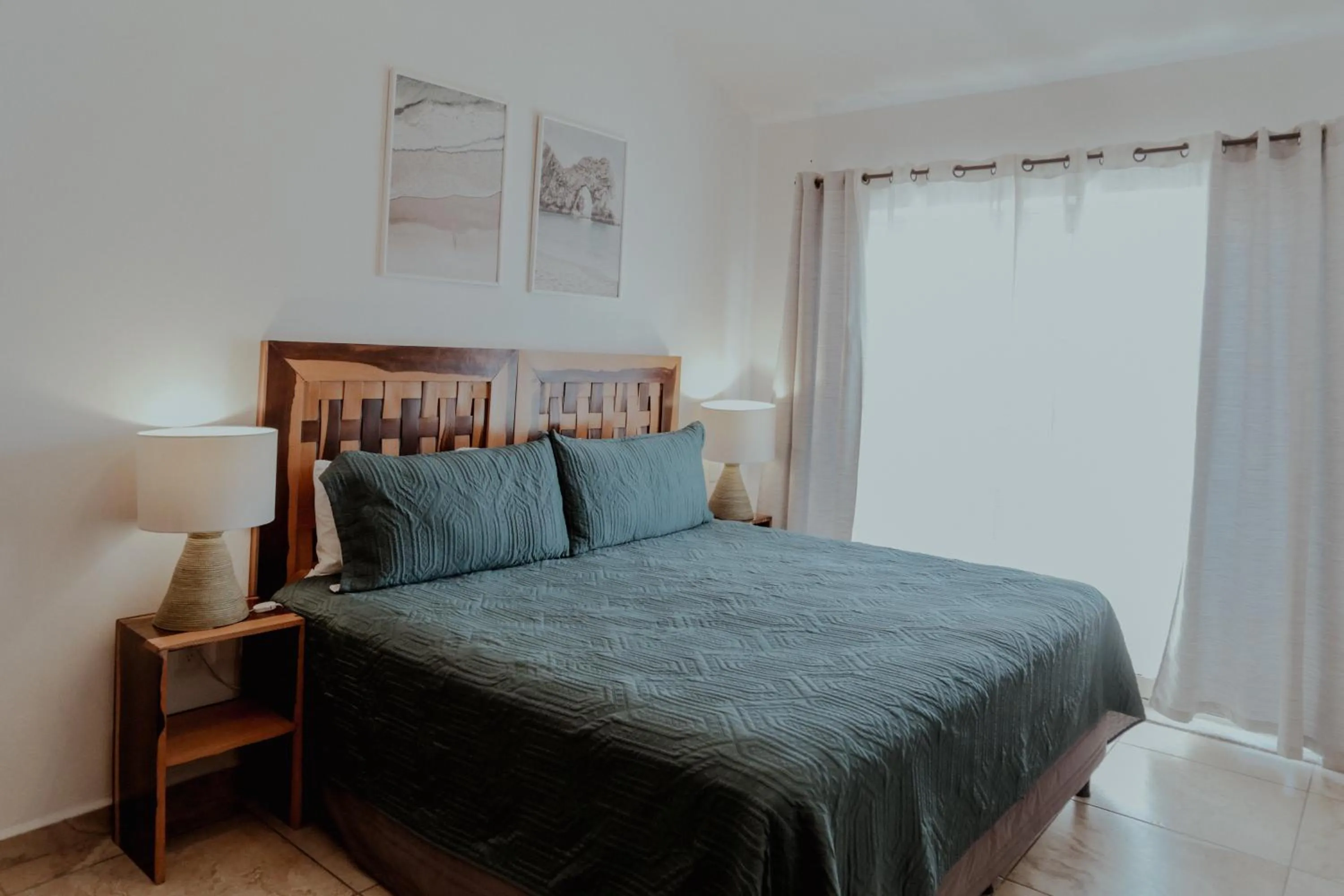 Bed in Fabiola Condo Hotel