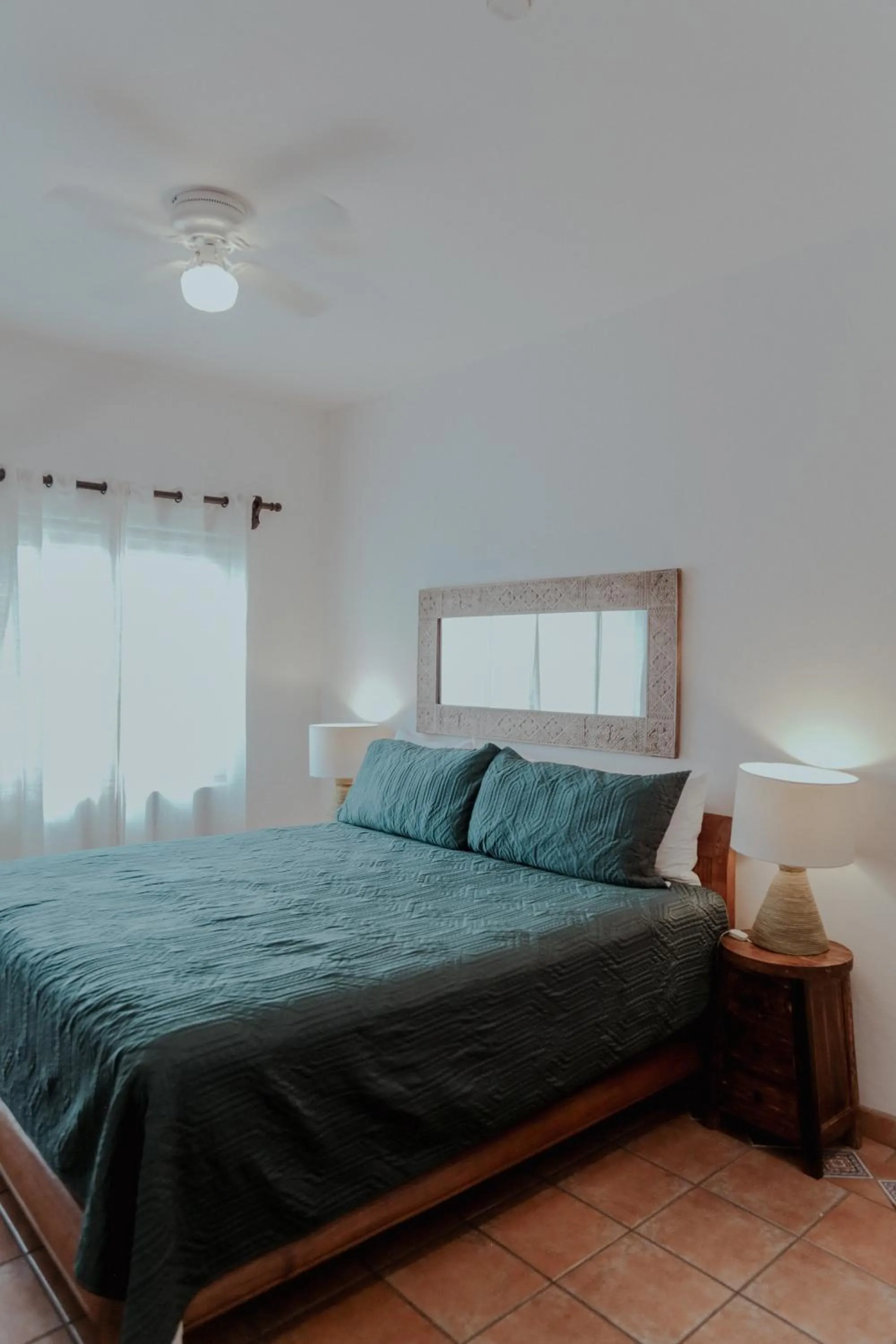 Bed in Fabiola Condo Hotel